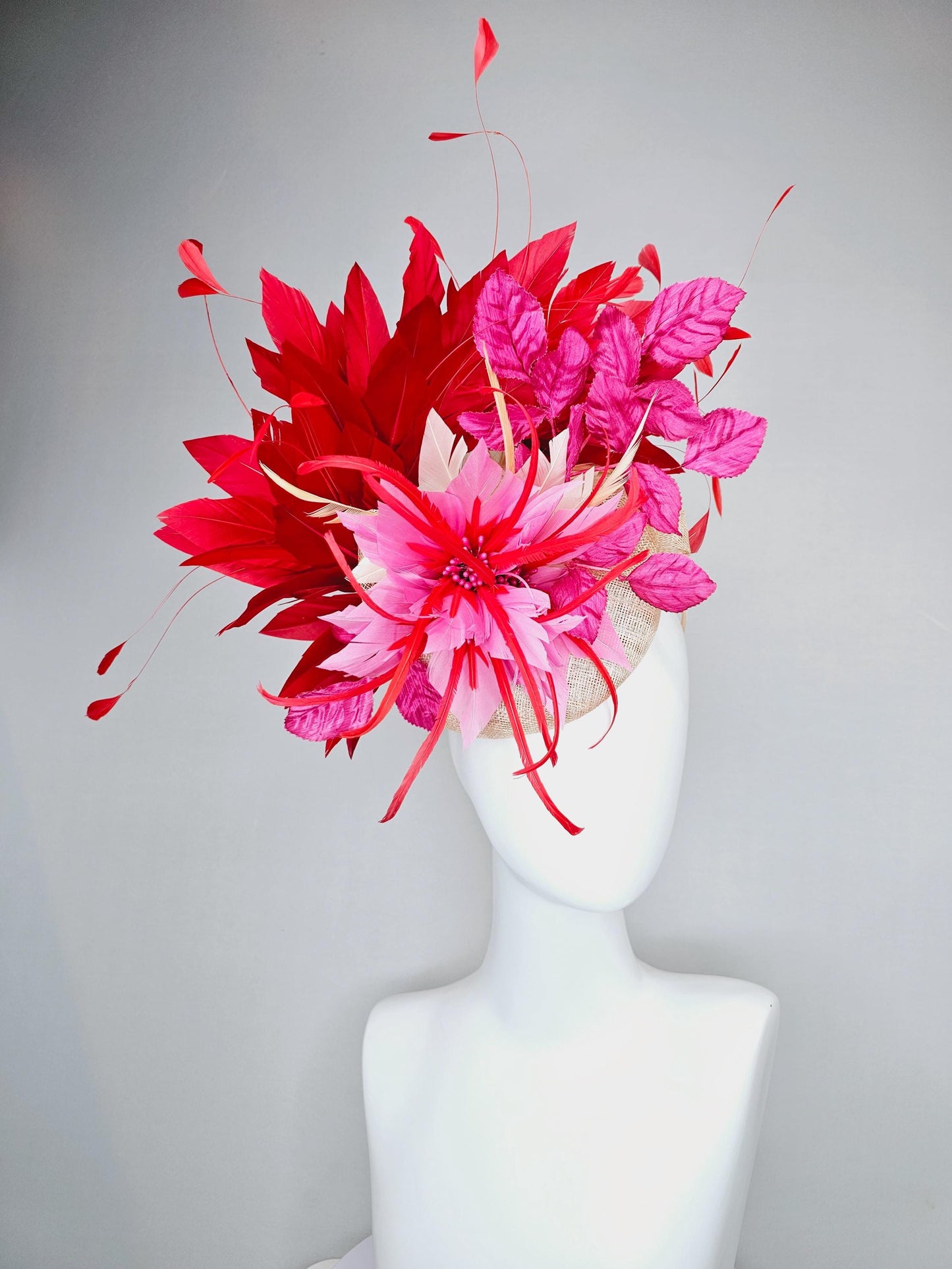 kentucky derby hat fascinator neutral beige sinamay with blush pink beige feather flower, bright pink leaves, scarlet red branching feathers