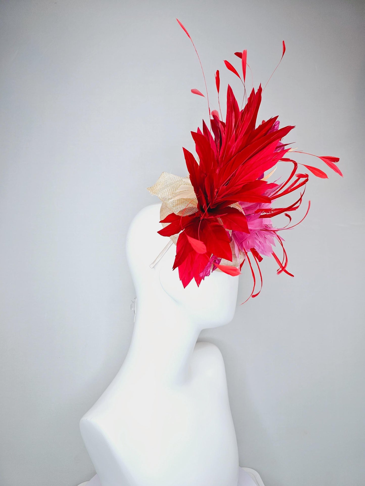 kentucky derby hat fascinator neutral beige sinamay with blush pink beige feather flower, bright pink leaves, scarlet red branching feathers