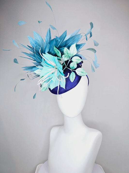 kentucky derby hat fascinator royal cobalt blue sinamay with sky blue feather flower, green velvet leaves, teal blue branching feathers