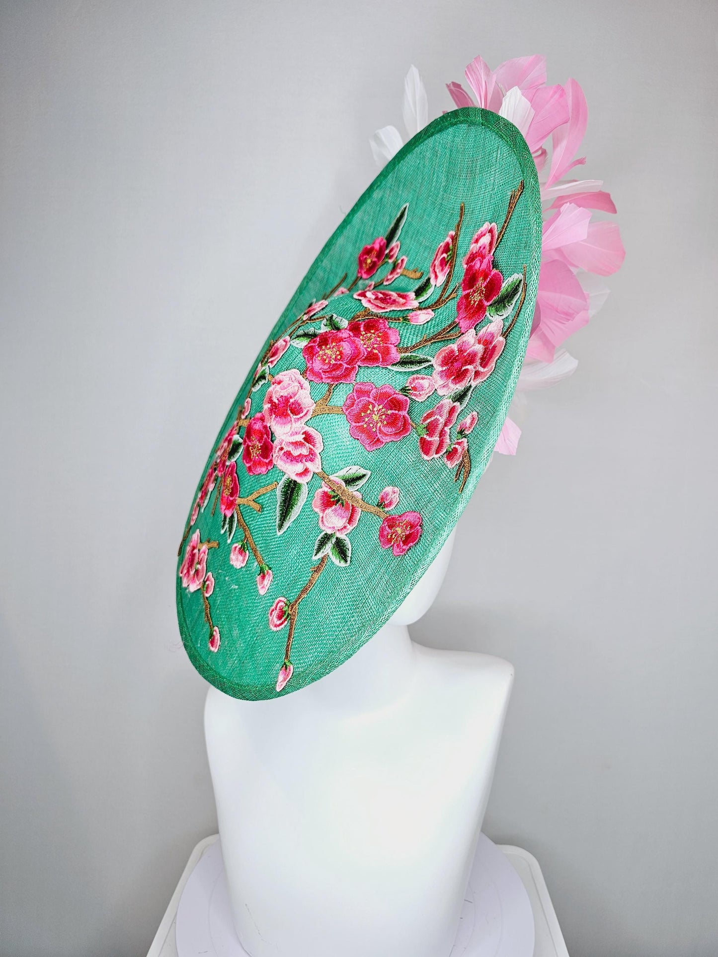 kentucky derby hat fascinator large mint green sinamay saucer with pink red green brown embroidered flowers, blush pink and white feathers