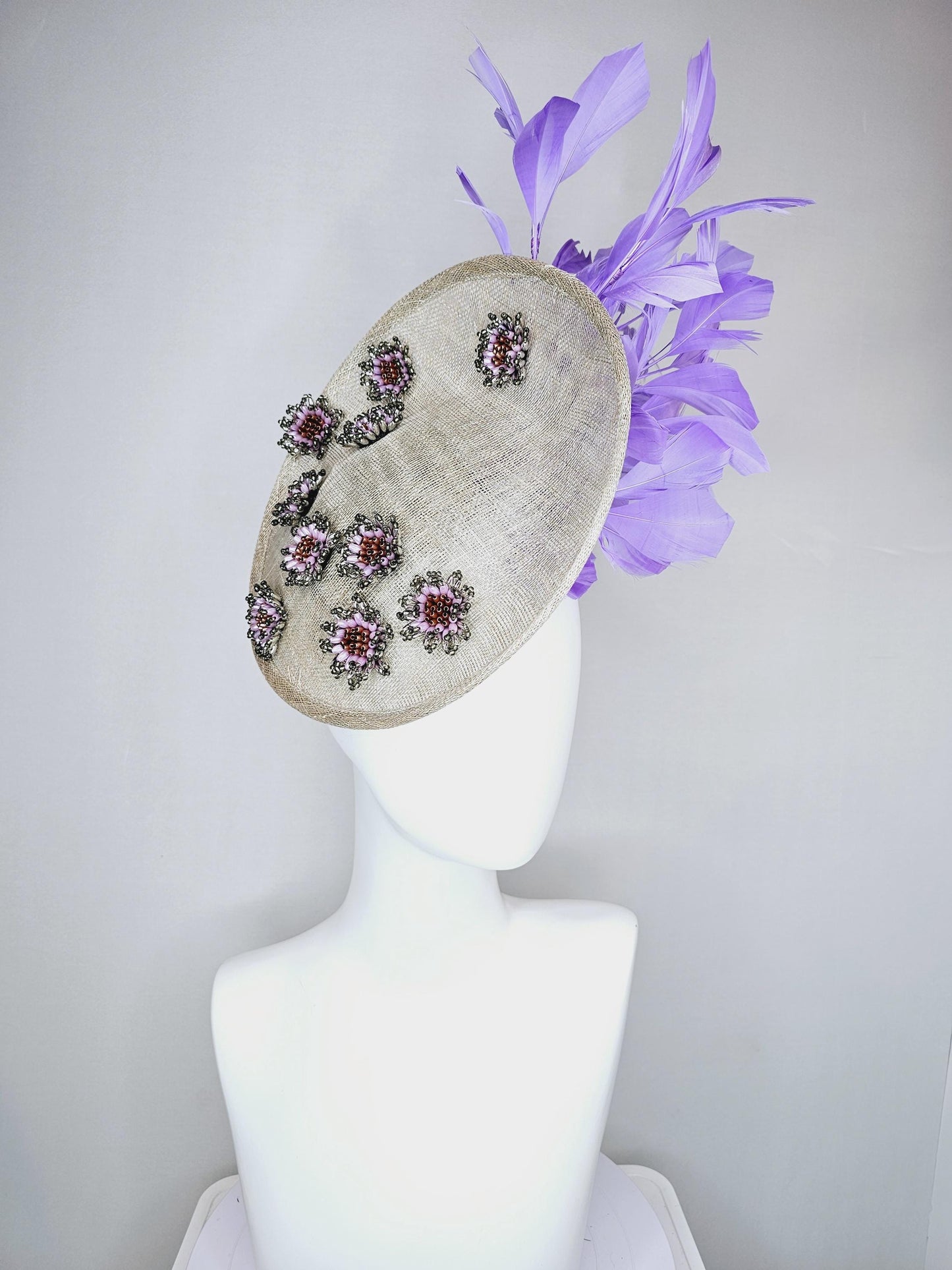 kentucky derby hat fascinator light gray sinamay saucer with silver lilac cooper crystal jewel beaded flowers and lavender purple feathers