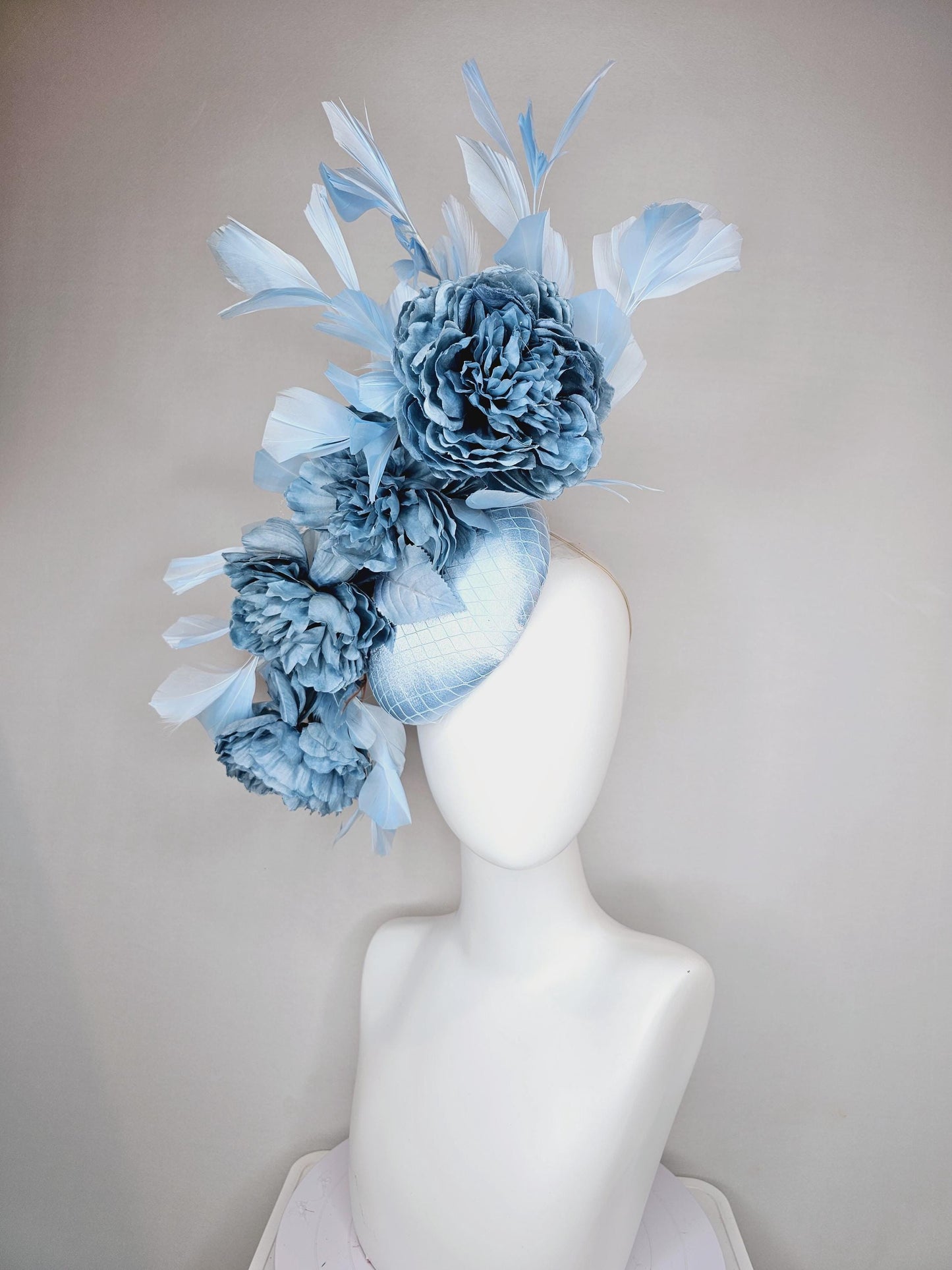 kentucky derby hat fascinator light blue satin with netting,satin silk large cerulean blue flowers,blue leaves and light baby blue feathers