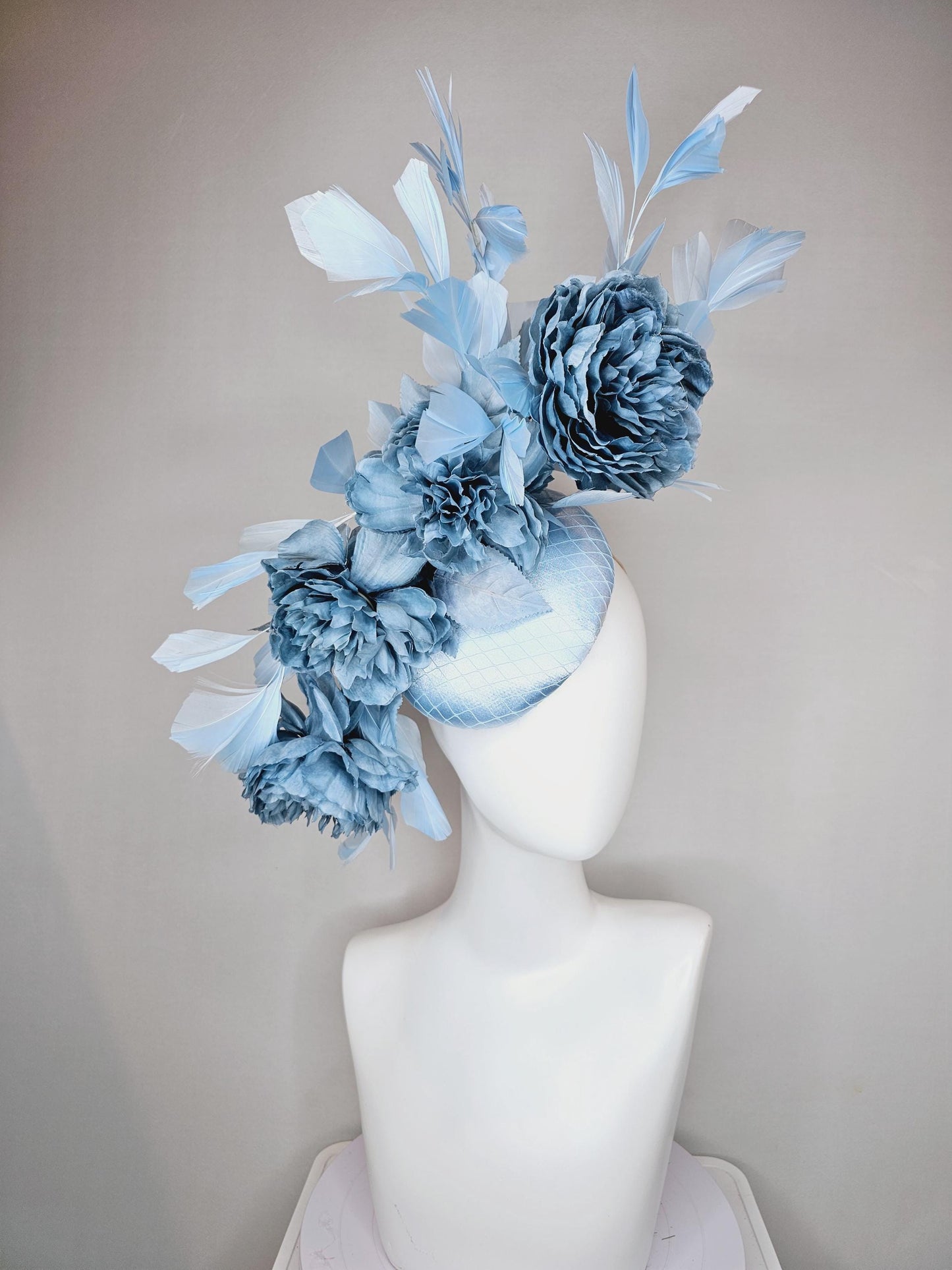 kentucky derby hat fascinator light blue satin with netting,satin silk large cerulean blue flowers,blue leaves and light baby blue feathers