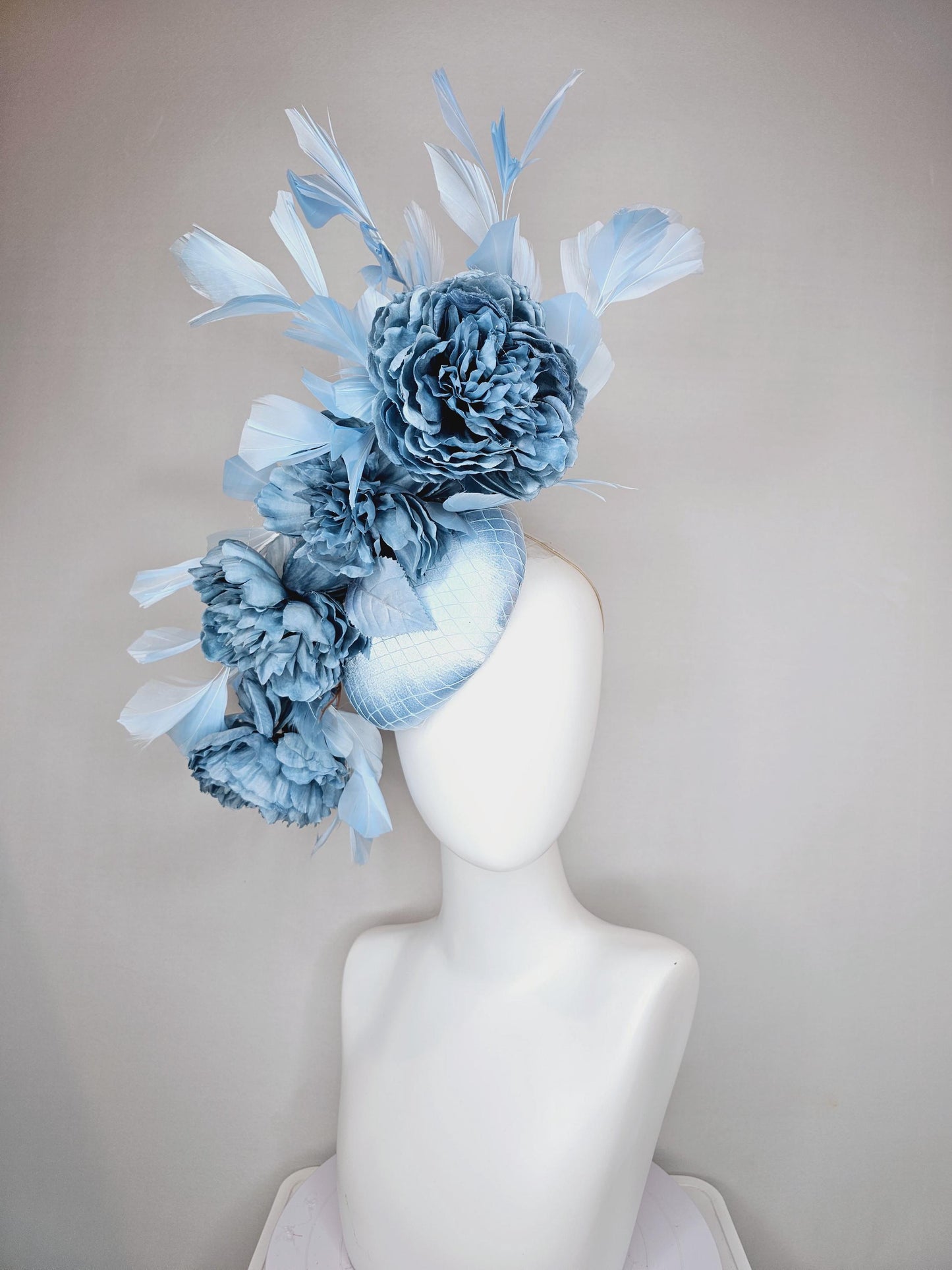 kentucky derby hat fascinator light blue satin with netting,satin silk large cerulean blue flowers,blue leaves and light baby blue feathers