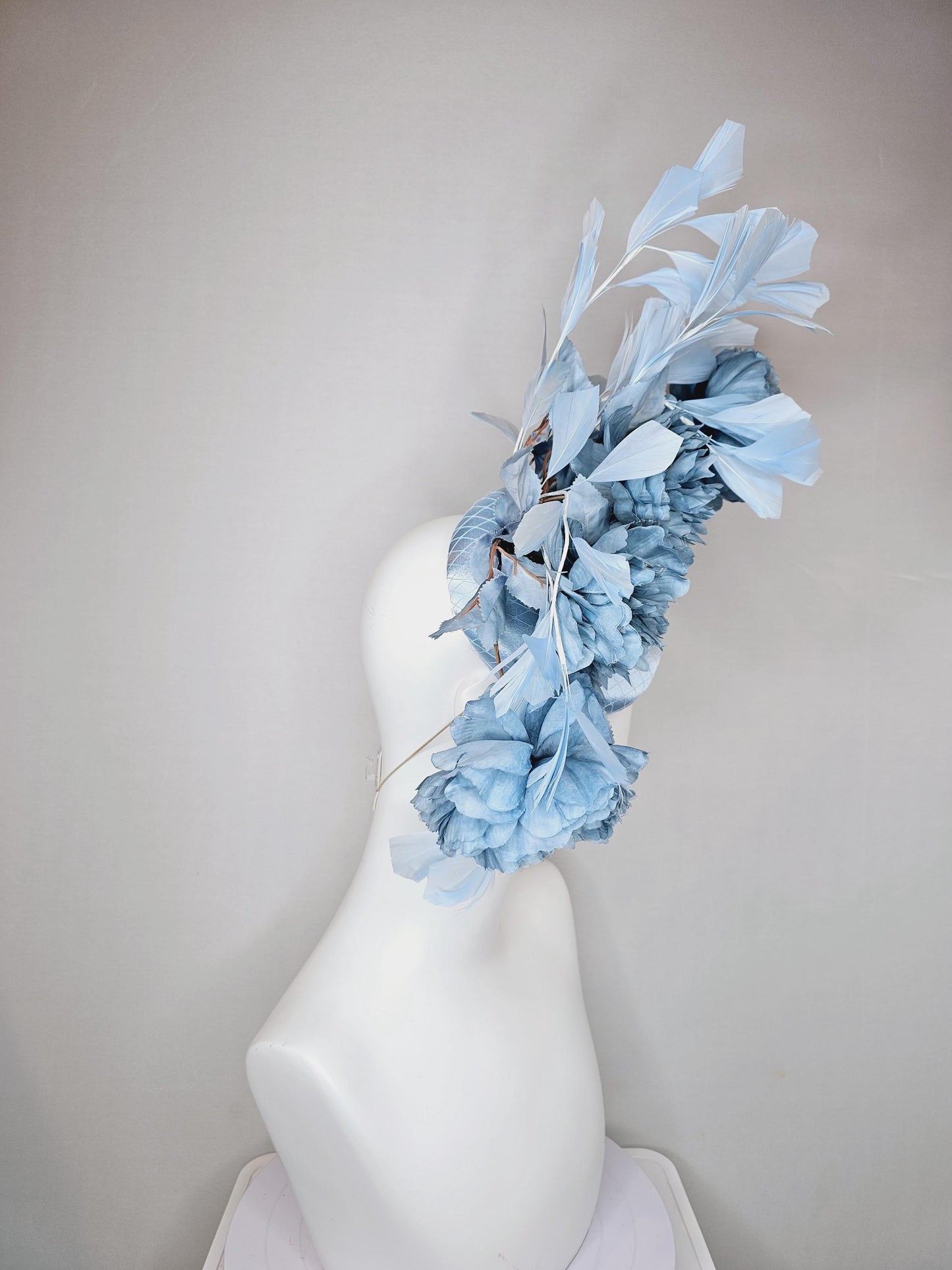 kentucky derby hat fascinator light blue satin with netting,satin silk large cerulean blue flowers,blue leaves and light baby blue feathers