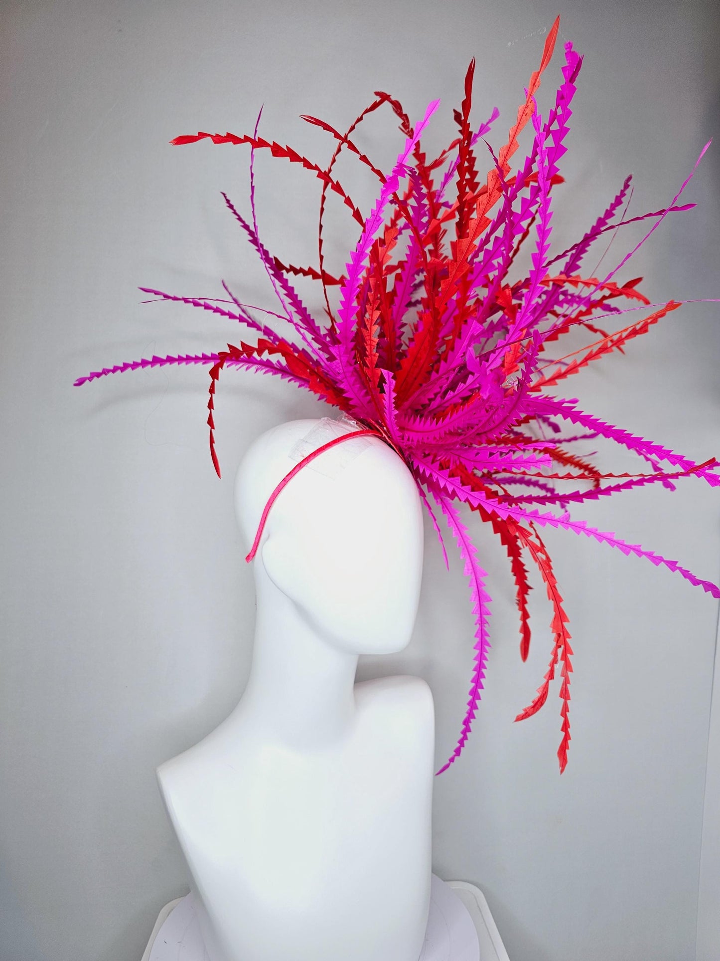 kentucky derby hat fascinator huge bright red and fuchsia pink zigzag long feather showstopper headpiece