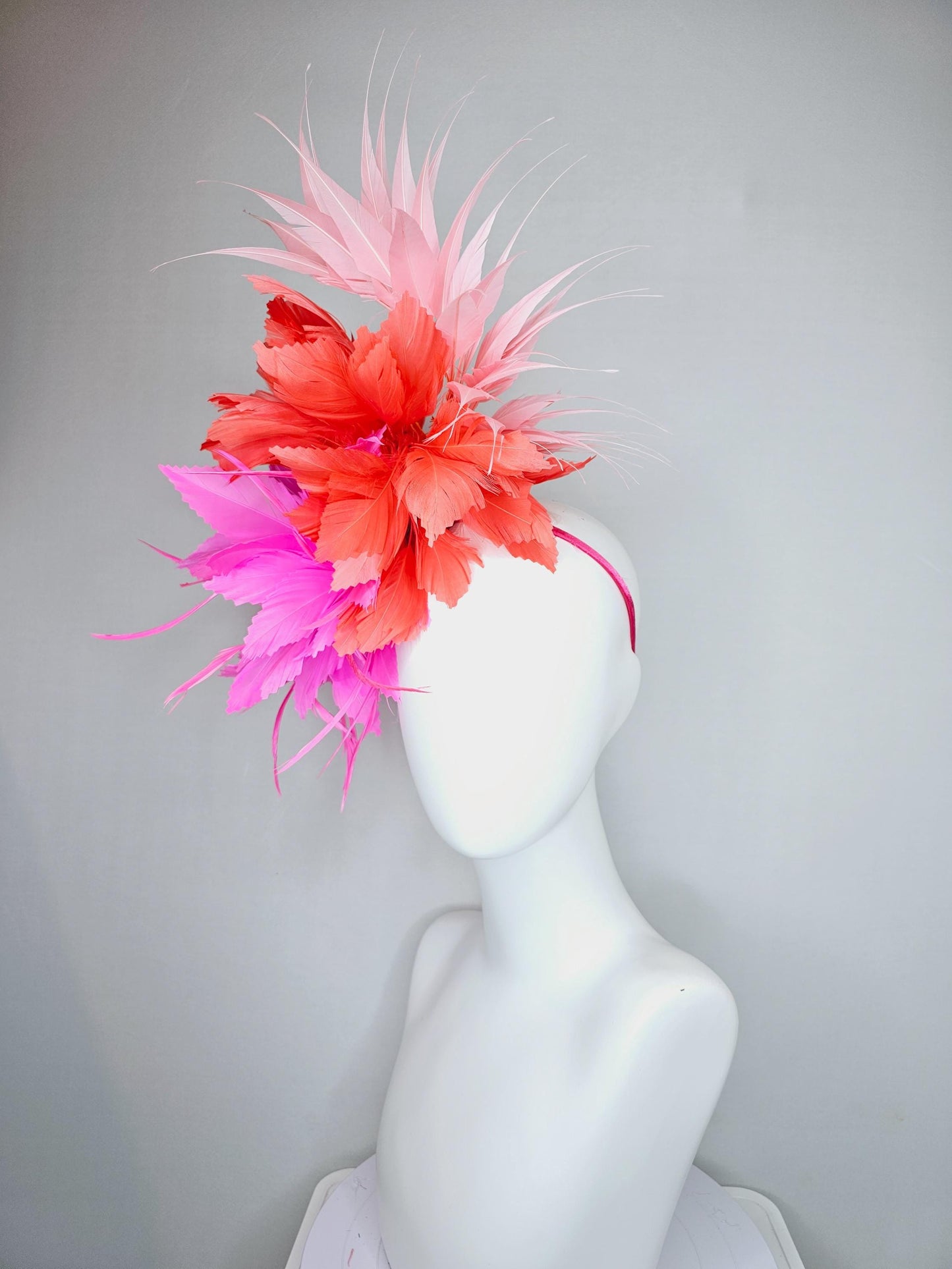 kentucky derby hat fascinator bright hot pink fluffy feather flower with coral orange branching feathers and light pink pointy feathers