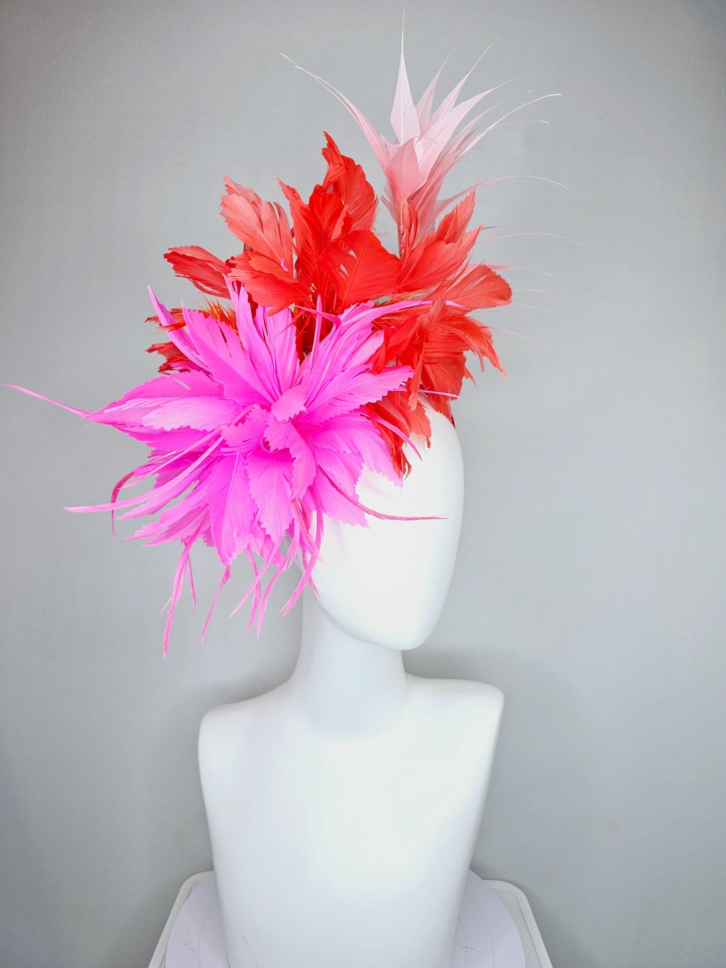 kentucky derby hat fascinator bright hot pink fluffy feather flower with coral orange branching feathers and light pink pointy feathers