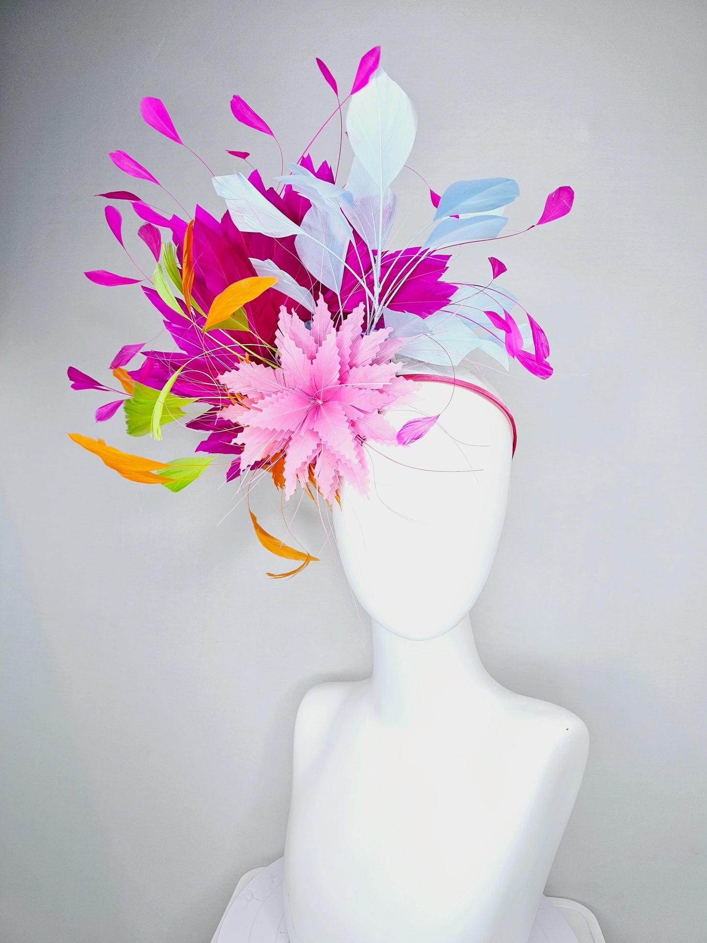 kentucky derby hat fascinator blush pink and orange zigzag feather flowers, colorful fuchsia pink, light blue, lime green branching feathers