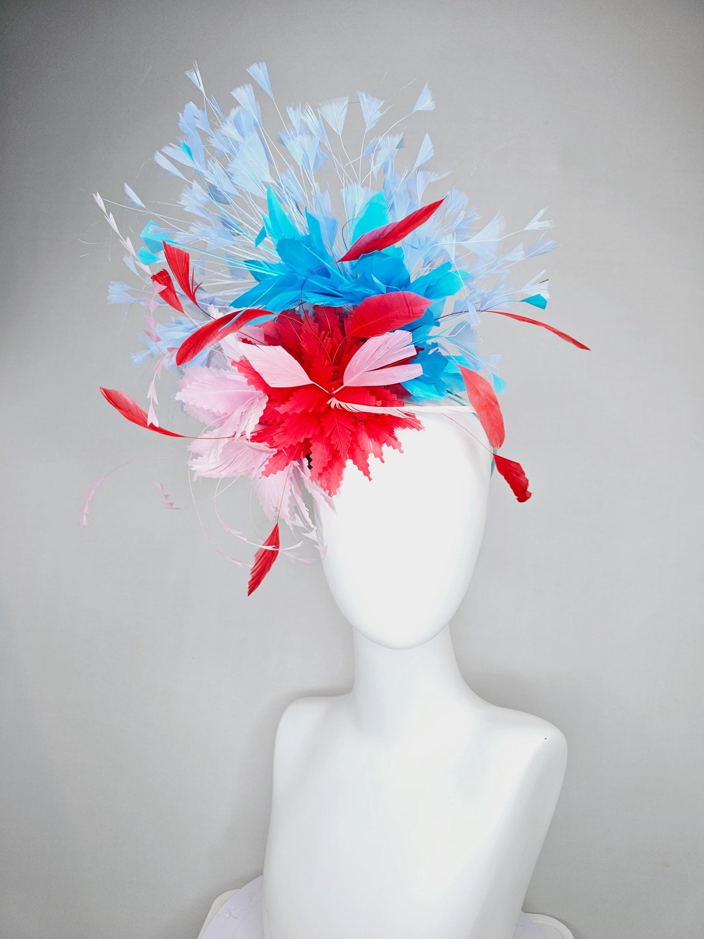 kentucky derby hat fascinator light pink and cherry red zigzag feather flowers with bright sky blue and light blue branching feathers