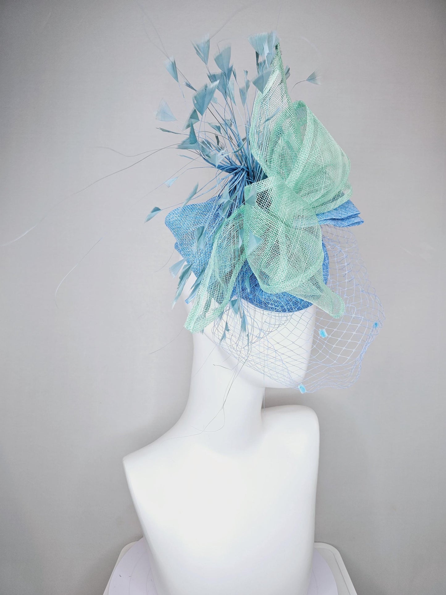 kentucky derby hat fascinator baby blue sinamay w/mint green mesh wired ribbon large bow decor,teal blue branching feathers w/blue mesh veil