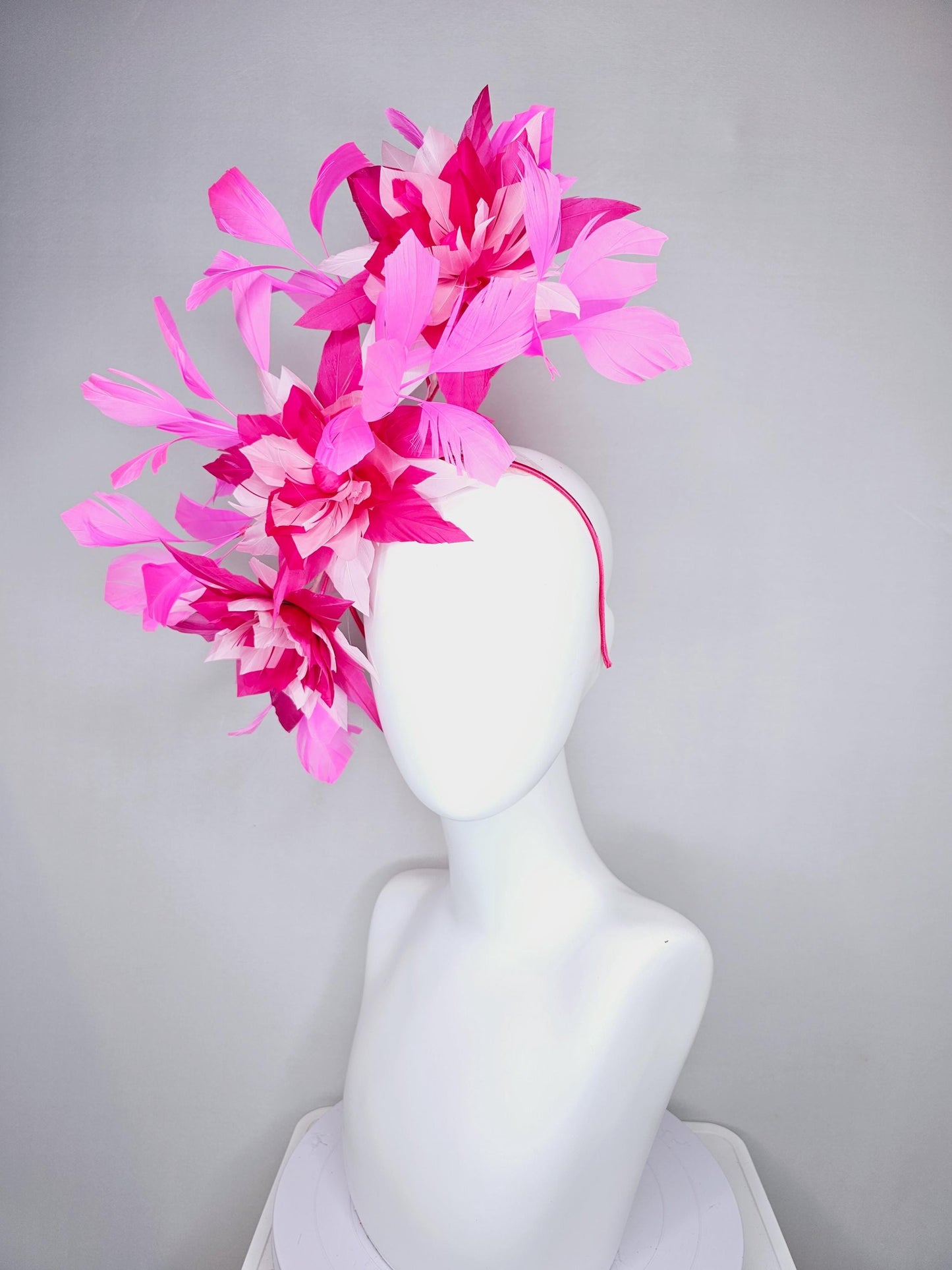 kentucky derby hat fascinator with large light baby pink raspberry hot pink feather flowers and blush pink branching feathers