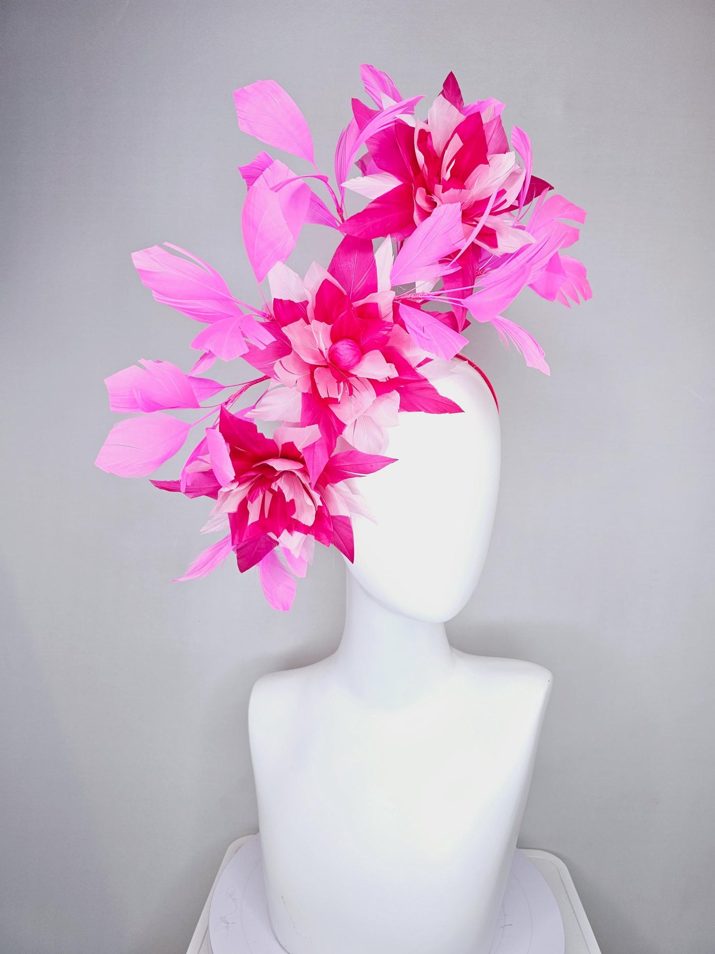 kentucky derby hat fascinator with large light baby pink raspberry hot pink feather flowers and blush pink branching feathers