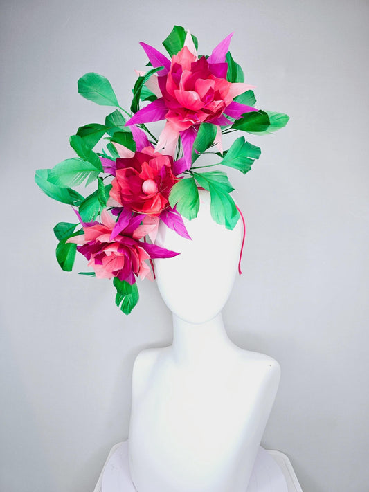 kentucky derby hat fascinator with large burgundy red raspberry red fuchsia pink feather flowers and emerald green branching feathers