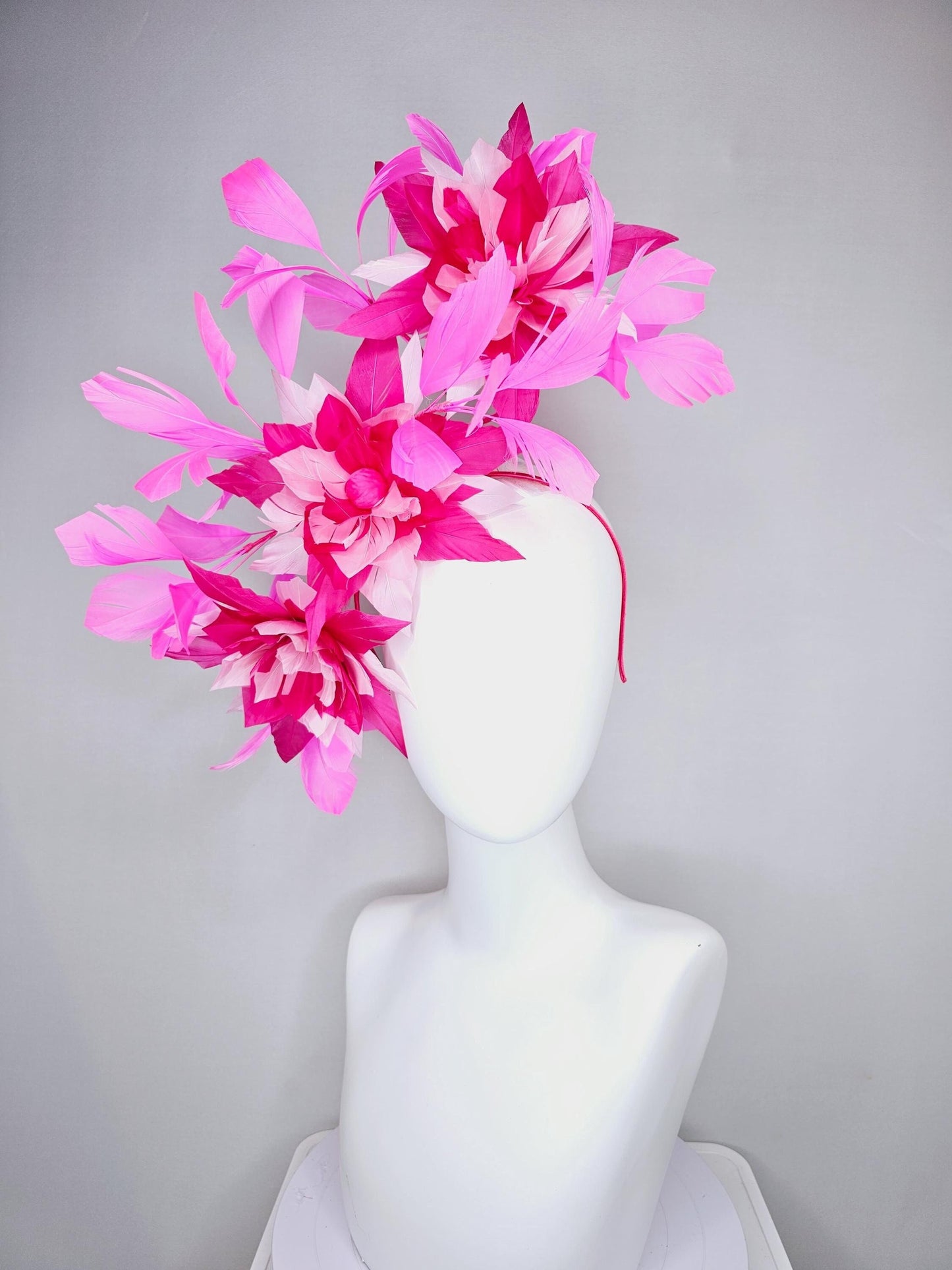 kentucky derby hat fascinator with large light baby pink raspberry hot pink feather flowers and blush pink branching feathers