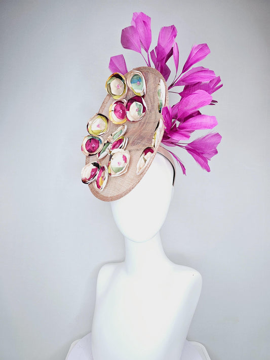 kentucky derby hat fascinator dusty pink champagne sinamay saucer with burgundy red yellow blue green satin flowers, magenta pink feathers