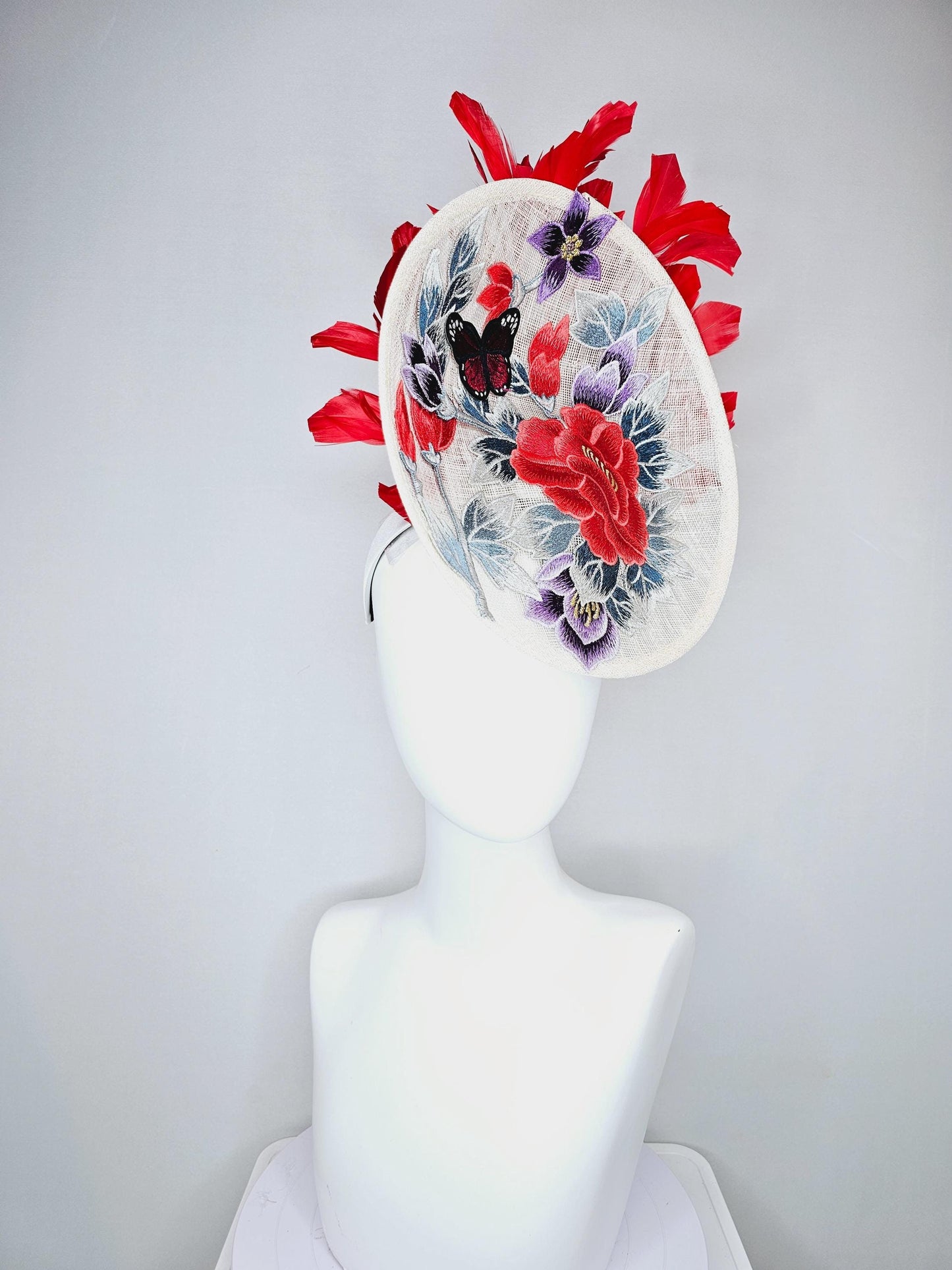 kentucky derby hat fascinator white sinamay saucer with red blue purple black embroidered flowers butterfly, scarlet red branching feathers
