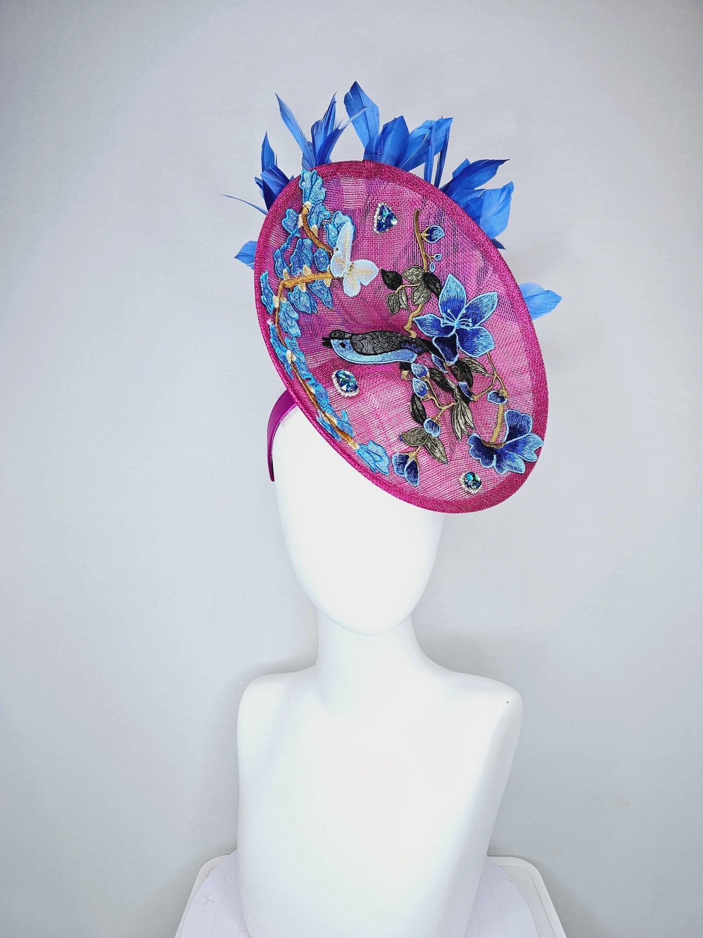 kentucky derby hat fascinator magenta pink sinamay saucer with blue gray embroidered flowers bird butterfly cobalt blue branching feathers