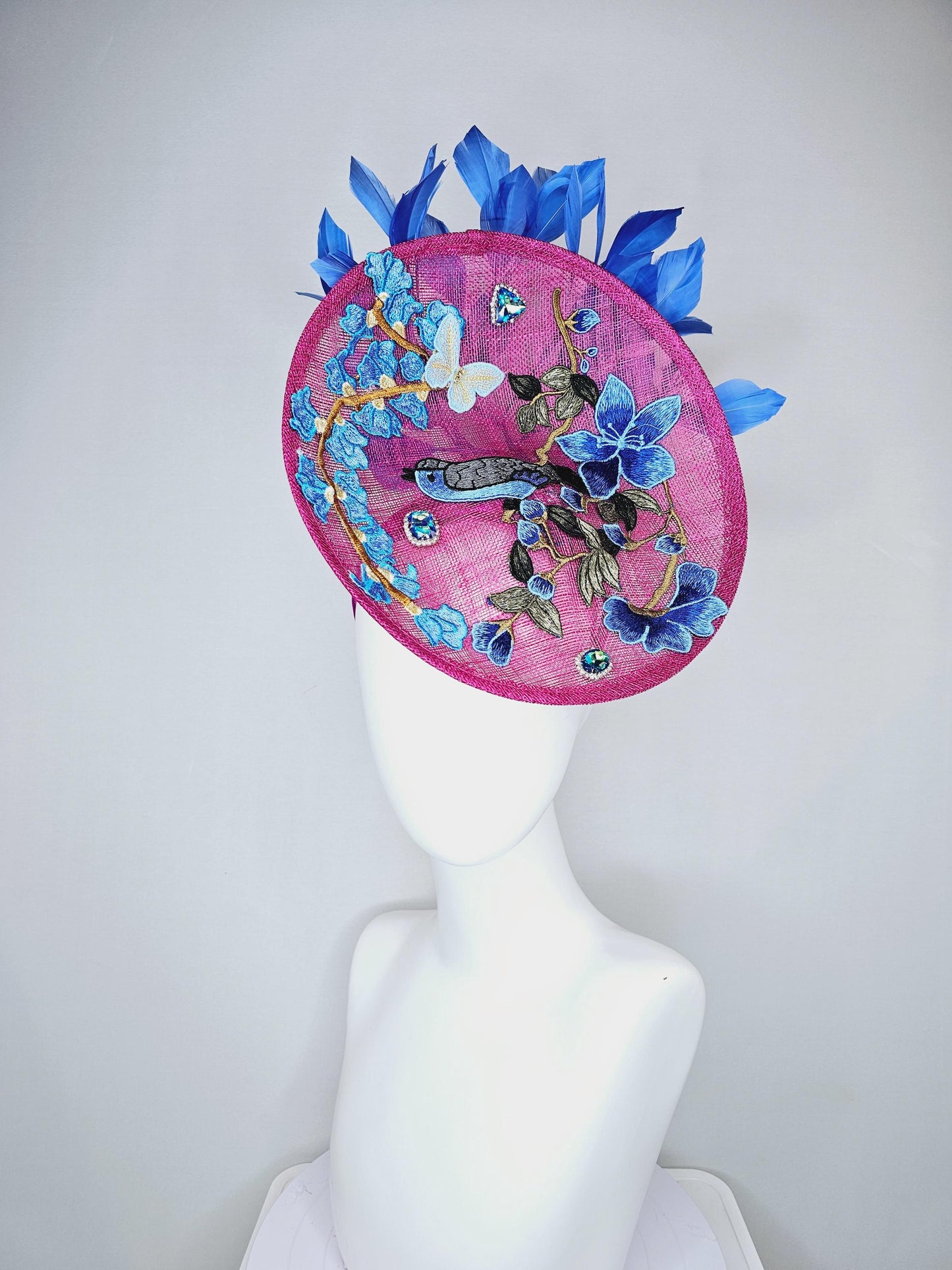 kentucky derby hat fascinator magenta pink sinamay saucer with blue gray embroidered flowers bird butterfly cobalt blue branching feathers