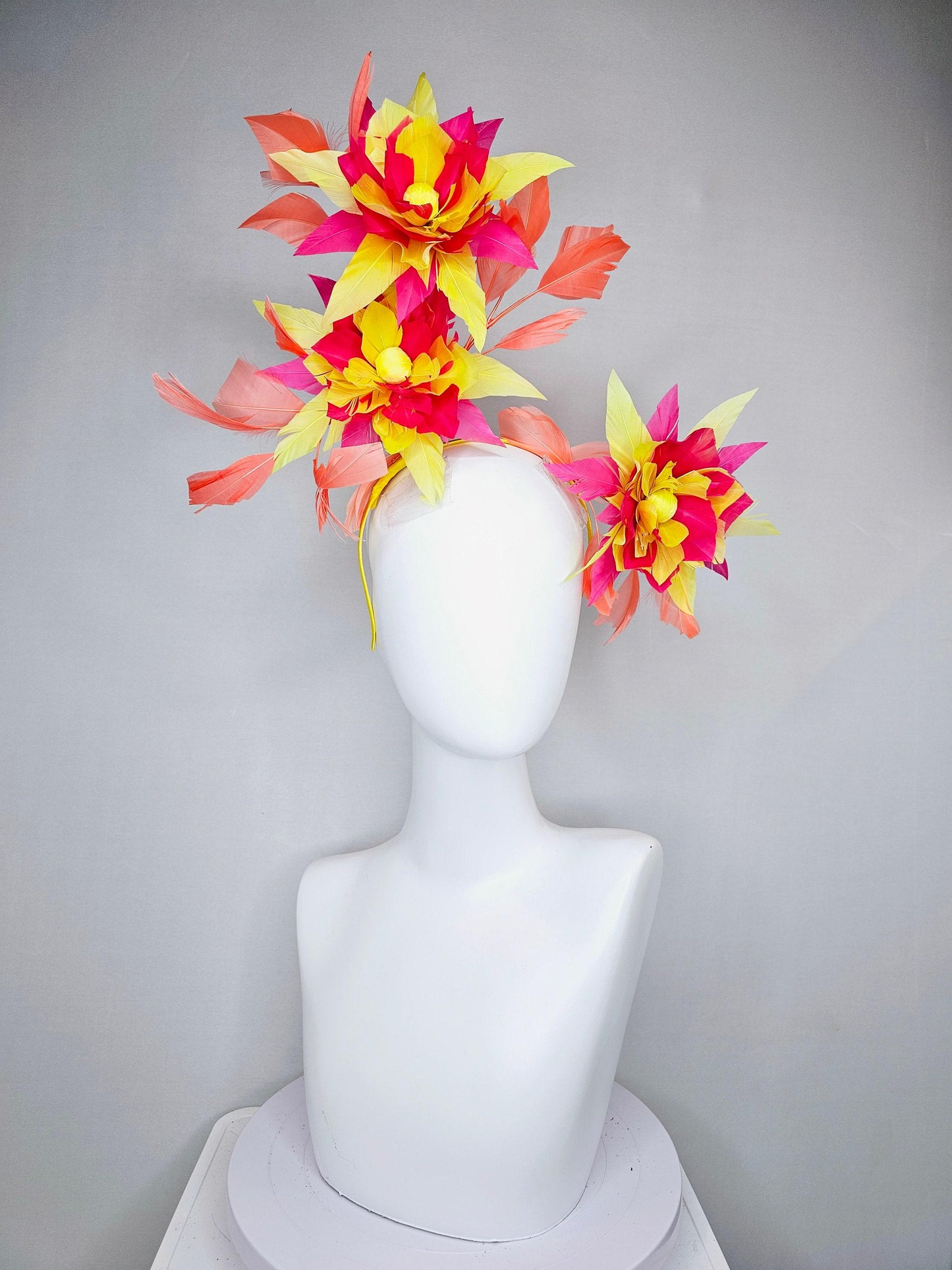 kentucky derby hat fascinator pink and yellow feather flowers with coral feathers on thin headband