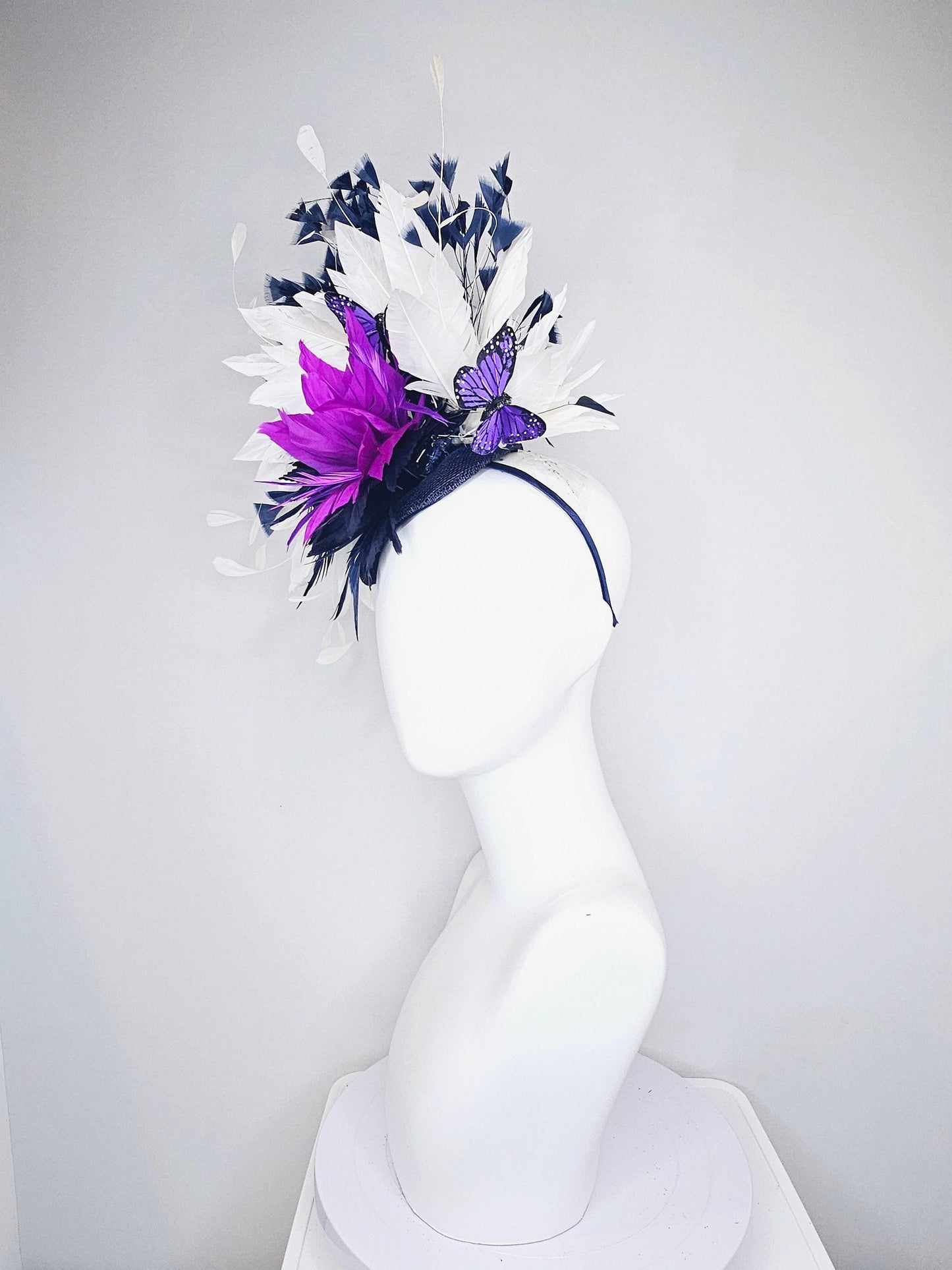 kentucky derby hat fascinator navy sinamay and navy blue purple feather flower navy and white feathers with purple and black butterflies