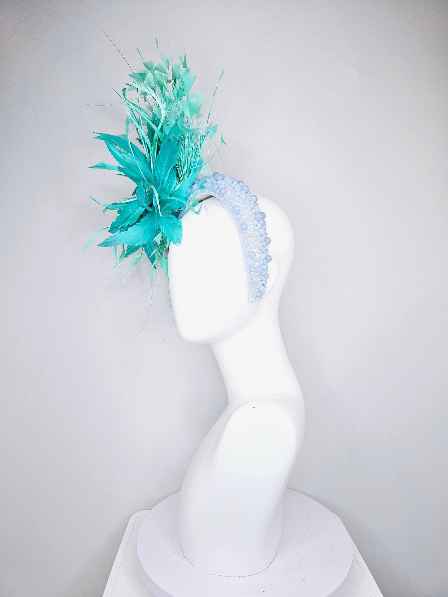 kentucky derby hat fascinator green feather flower and feathers with light blue pearl beaded headband