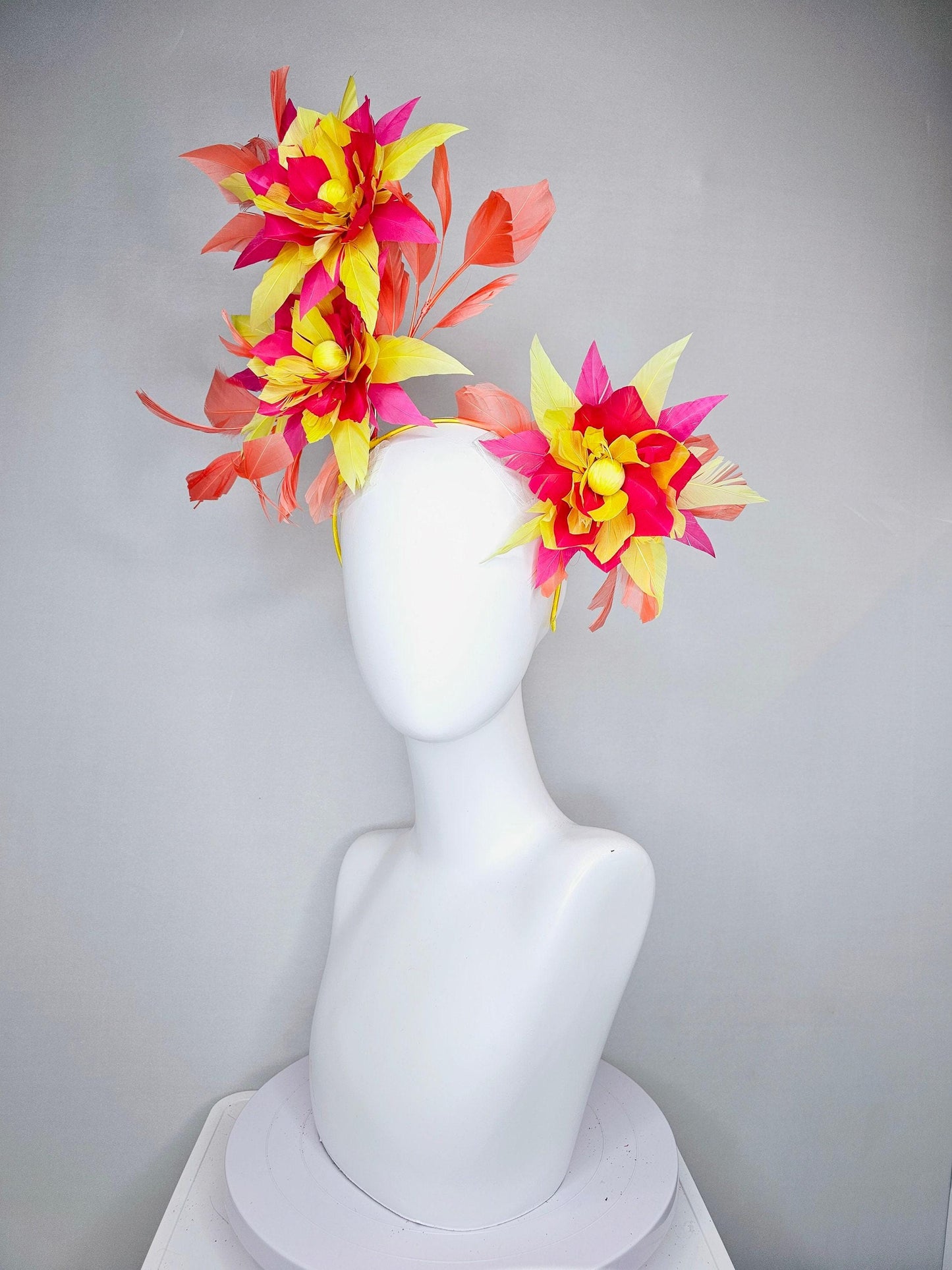 kentucky derby hat fascinator pink and yellow feather flowers with coral feathers on thin headband