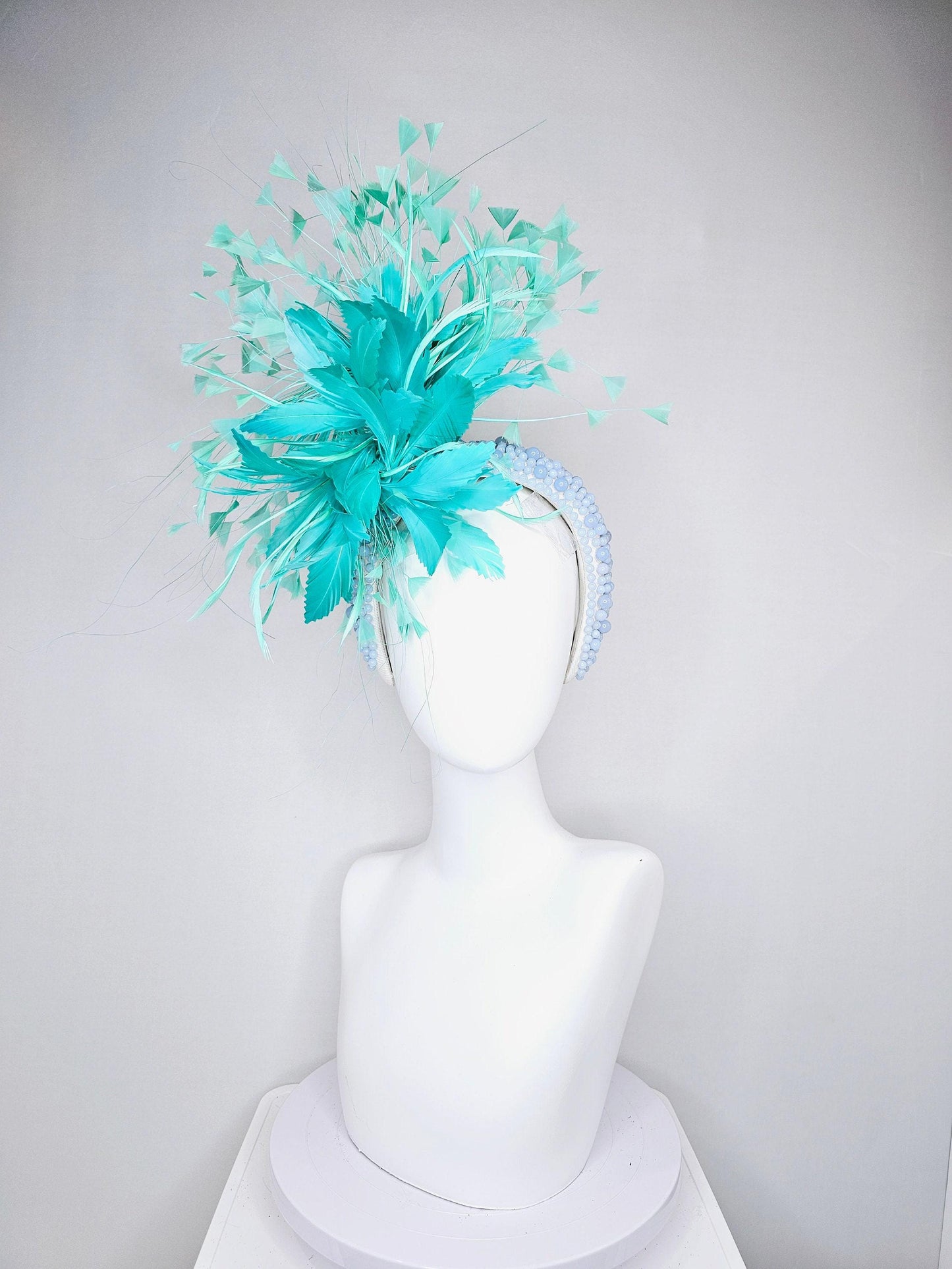 kentucky derby hat fascinator green feather flower and feathers with light blue pearl beaded headband