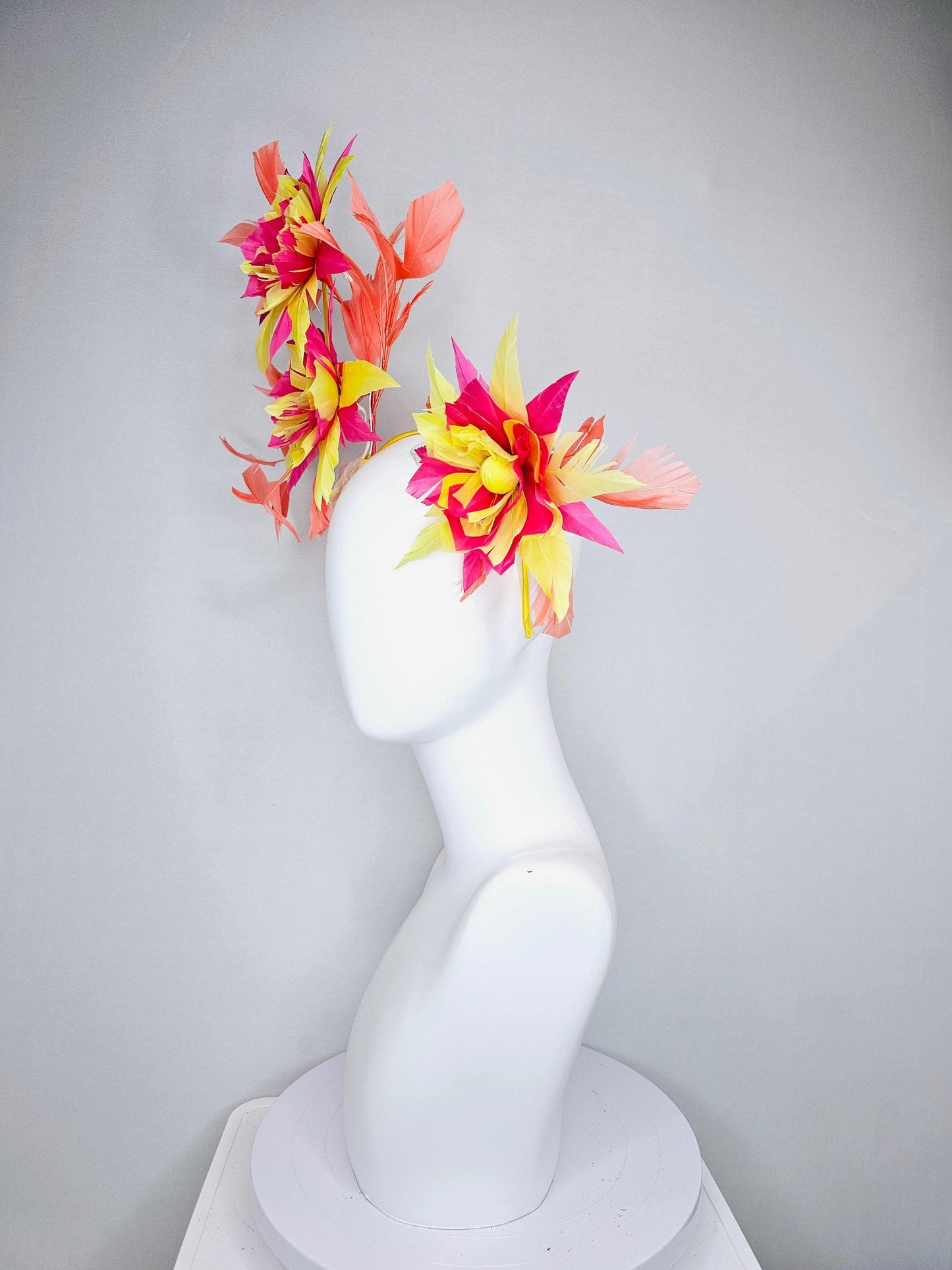 kentucky derby hat fascinator pink and yellow feather flowers with coral feathers on thin headband