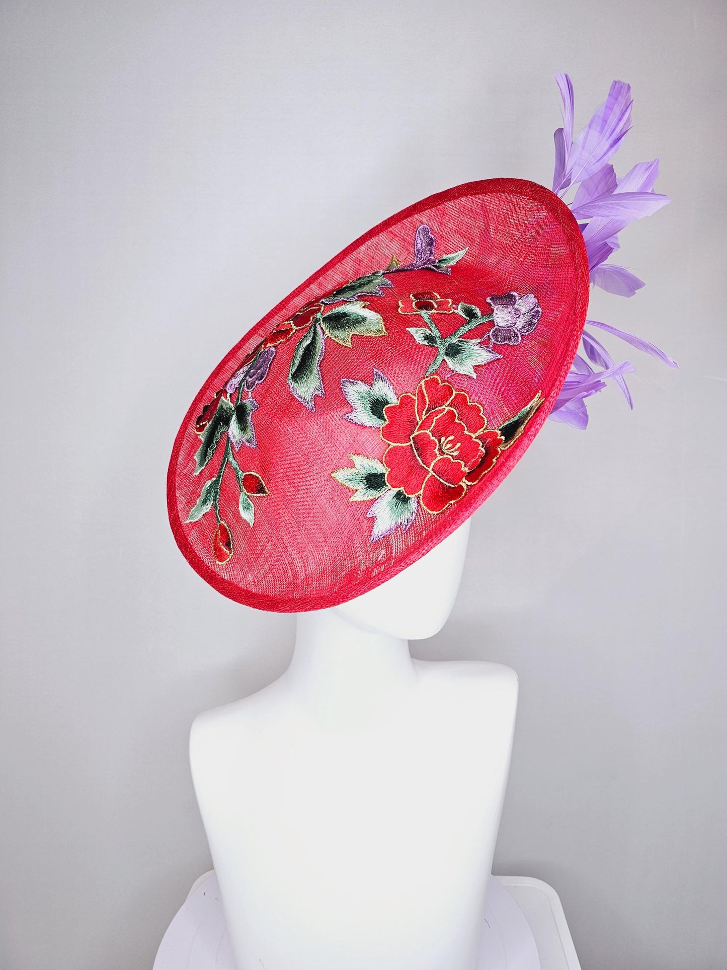 kentucky derby hat fascinator red sinamay saucer with red purple gold green embroidered flowers and lavender purple branching feathers