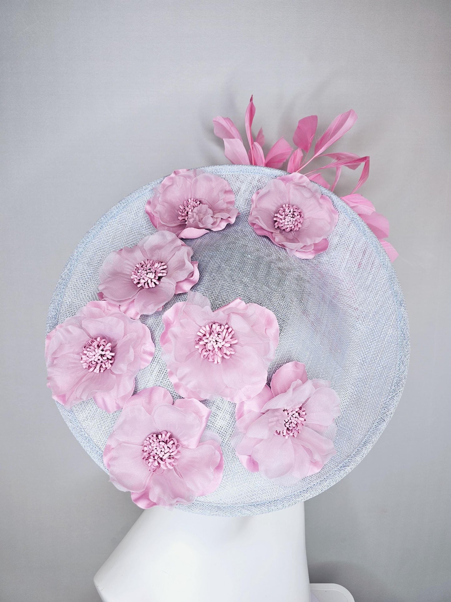 kentucky derby hat fascinator light gray sinamay saucer with light pink organza satin flowers and blush pink branching feathers
