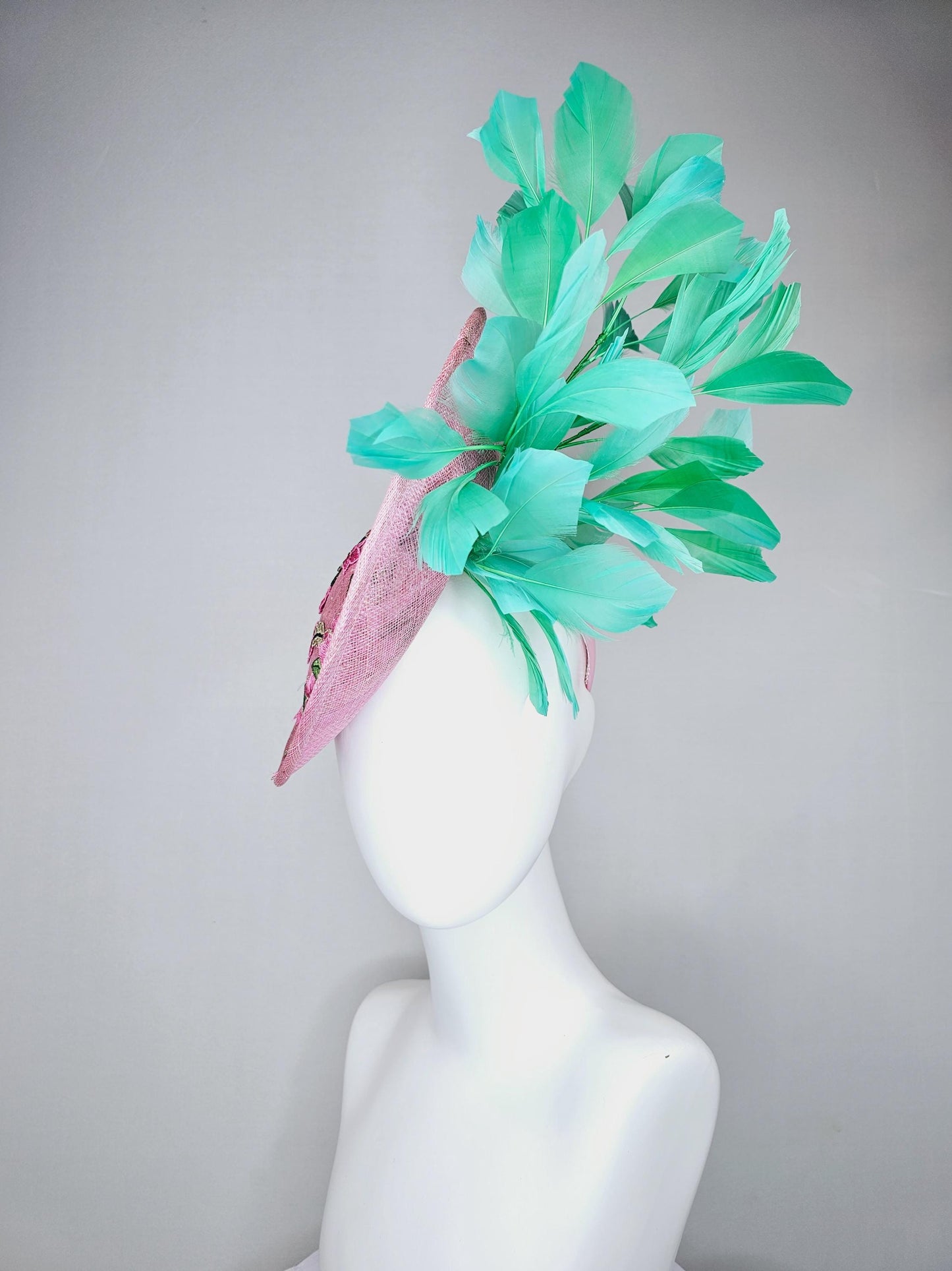 kentucky derby hat fascinator light pink sinamay saucer with pink flowers green leaves embroidered and aqua mint green branching feathers