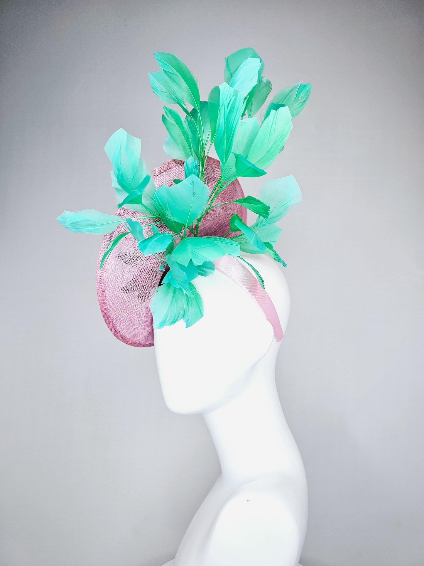 kentucky derby hat fascinator light pink sinamay saucer with pink flowers green leaves embroidered and aqua mint green branching feathers