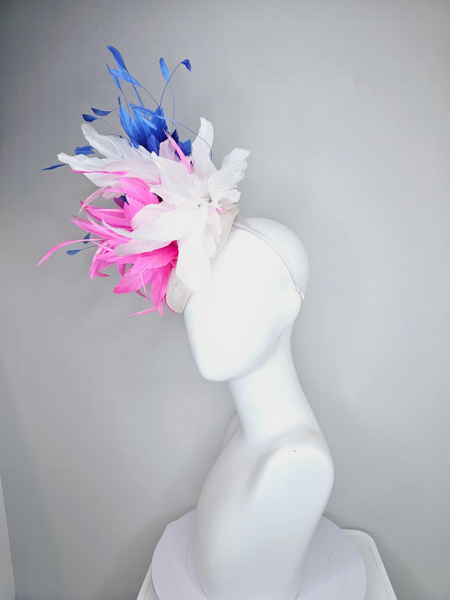 kentucky derby hat fascinator white sinamay with fluffy blush pink zigzag feather flower and white and cobalt royal blue branching feathers
