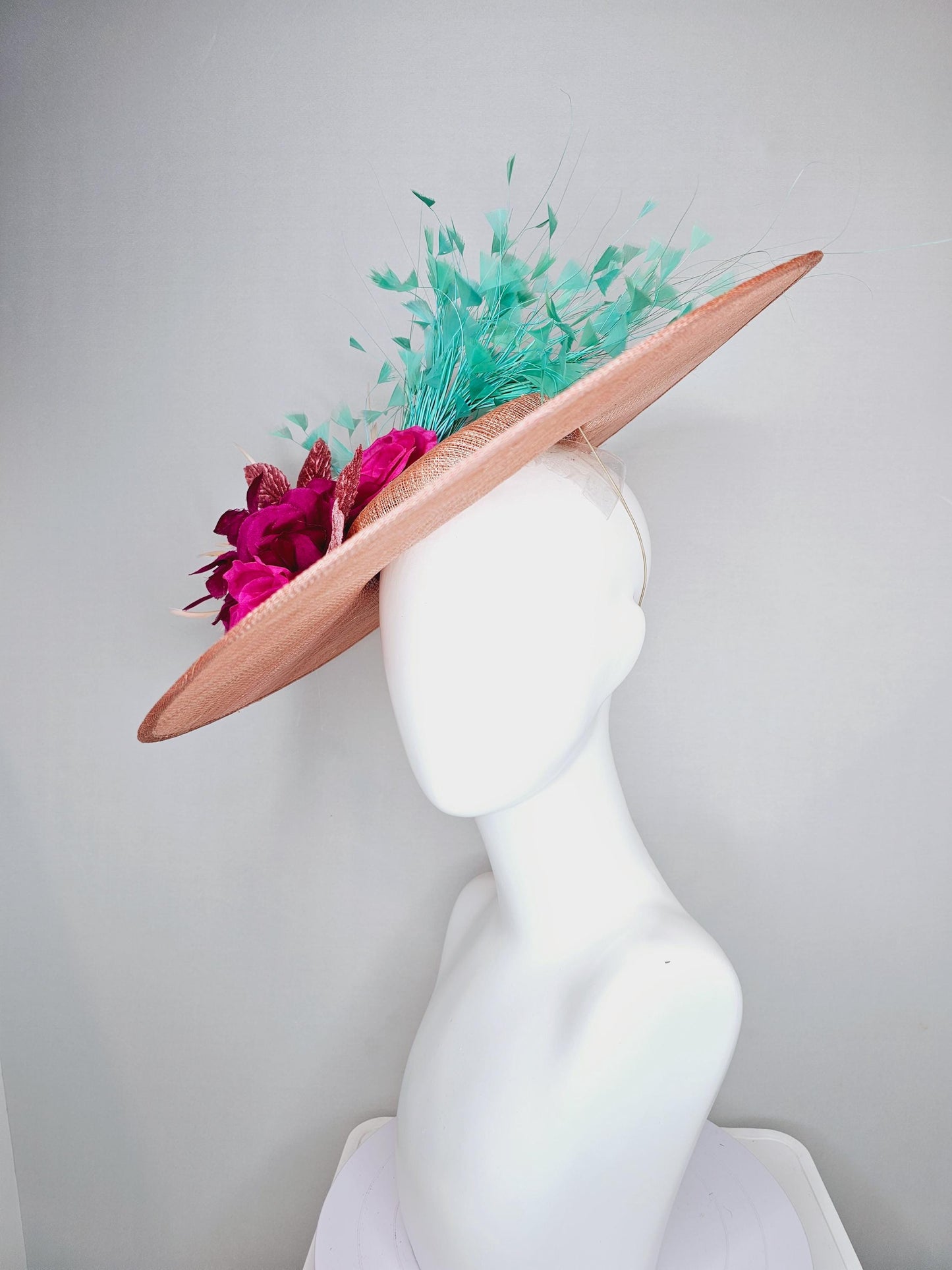 kentucky derby hat wide brim coral orange sinamay with bright fuchsia pink satin roses light pink leaves mint green neutral beige feathers