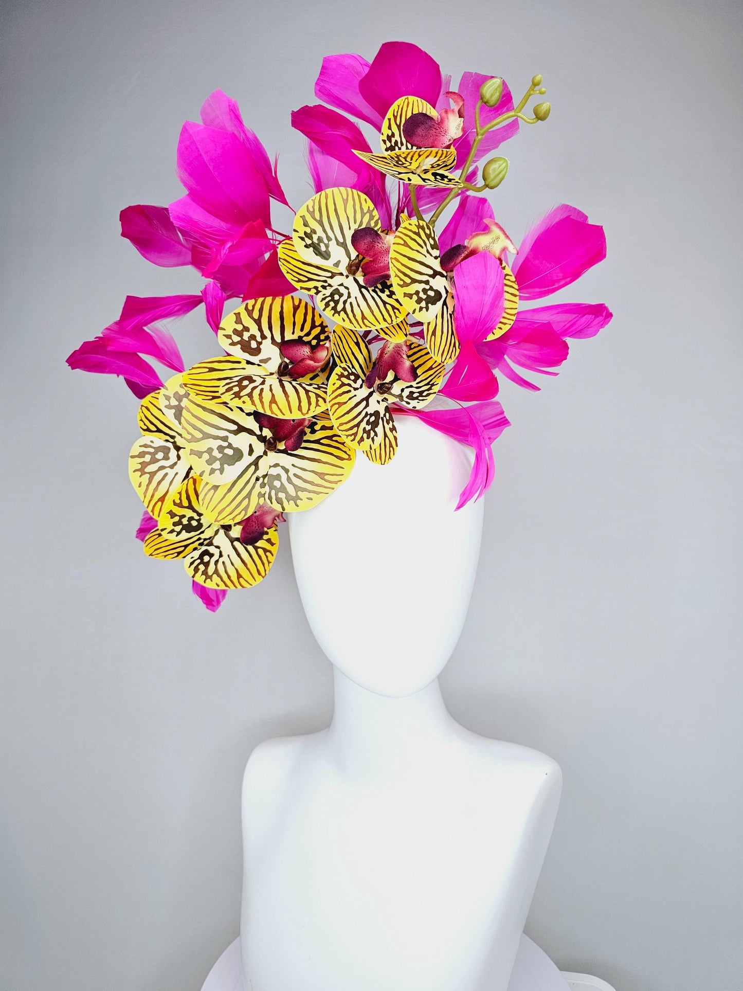 kentucky derby hat fascinator large yellow black and burgundy red satin silk orchid flowers with bright fuchsia pink branching feathers