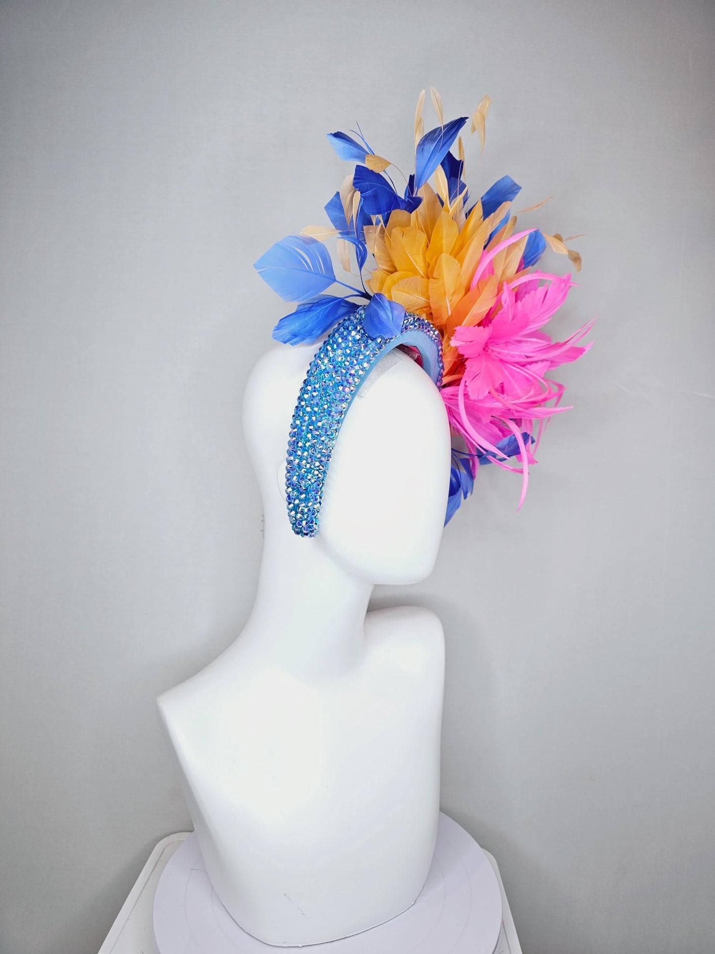 kentucky derby hat fascinator iridescent sky blue crystal headband pink zigzag feather flowers light tangerine orange cobalt blue feathers