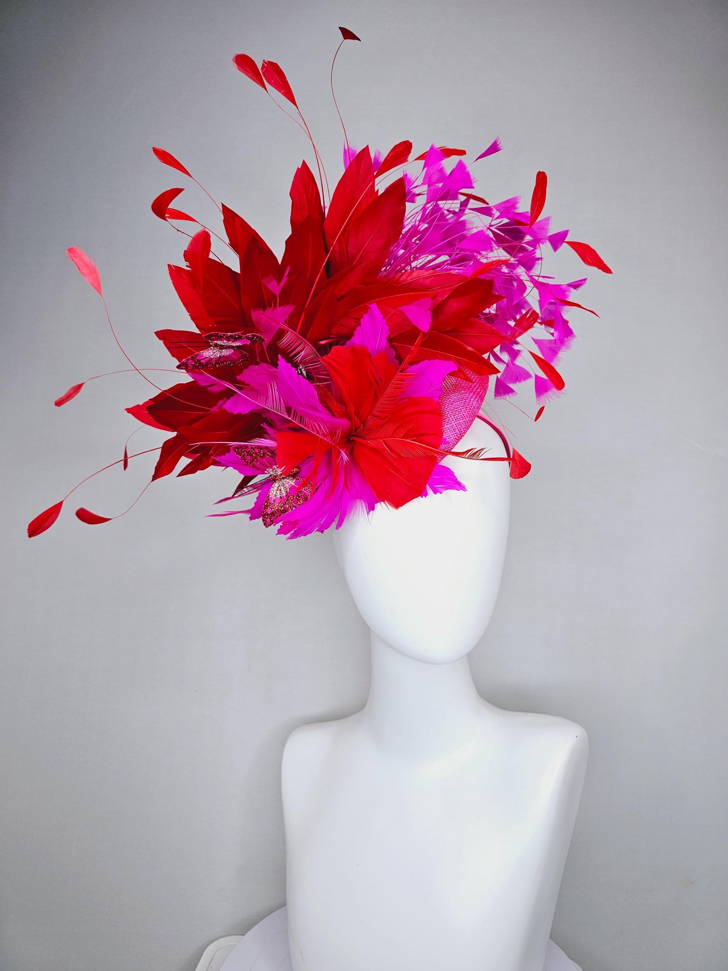 kentucky derby hat fascinator pink sinamay with scarlet red and fuchsia pink zigzag feather flower red pink feathers red pink butterflies