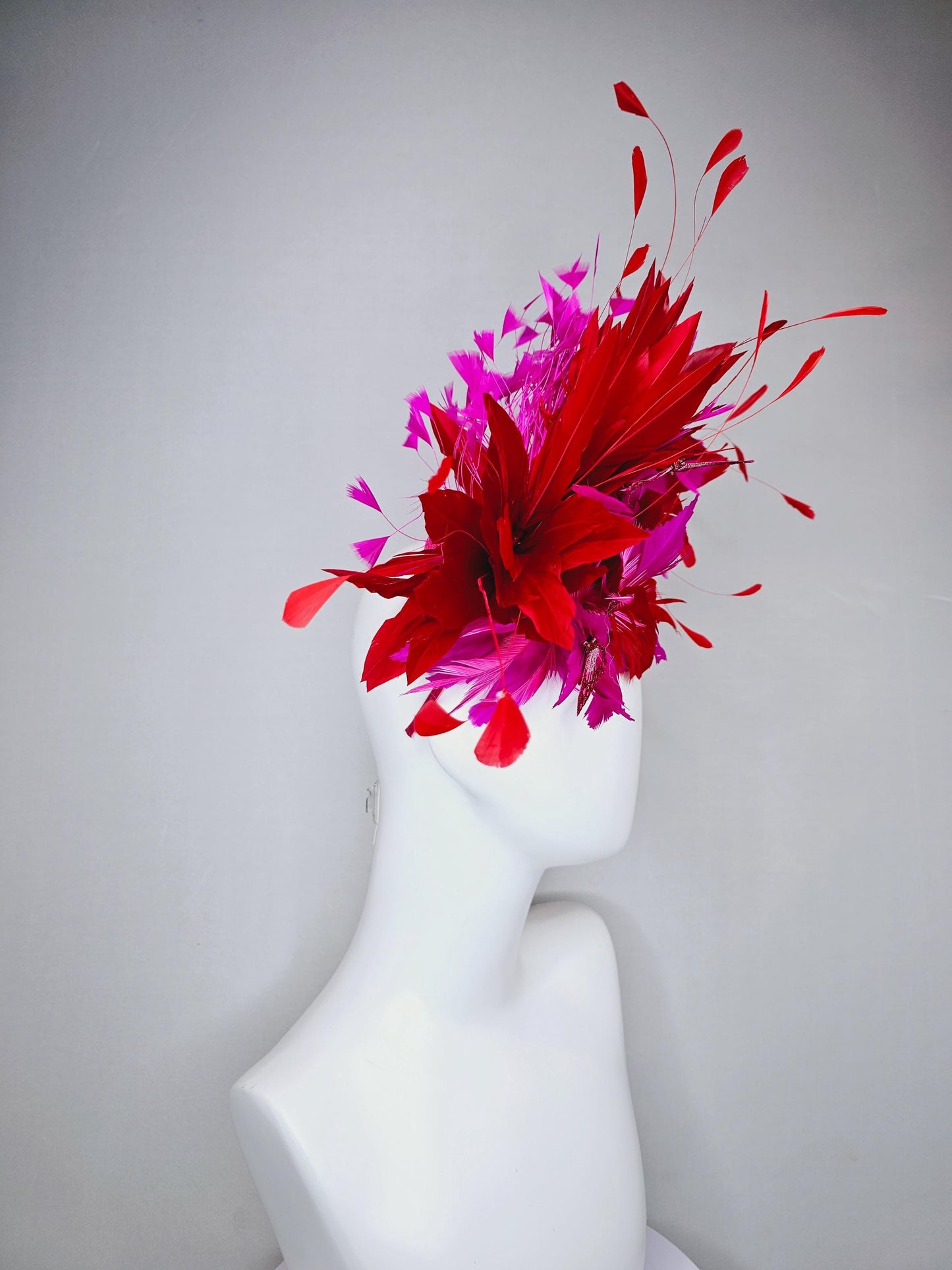kentucky derby hat fascinator pink sinamay with scarlet red and fuchsia pink zigzag feather flower red pink feathers red pink butterflies