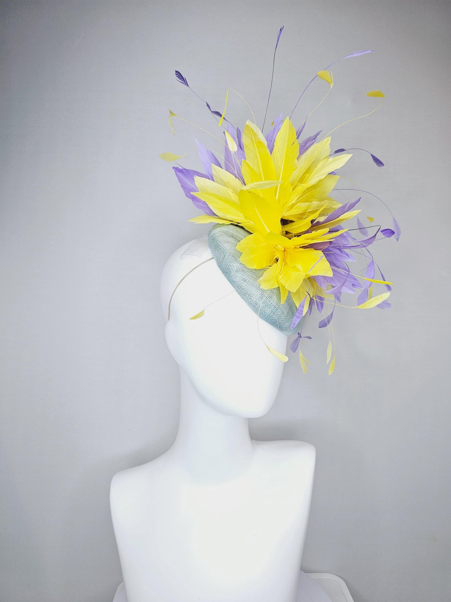 kentucky derby hat fascinator light blue sinamay base with bright yellow and lavender purple feathers