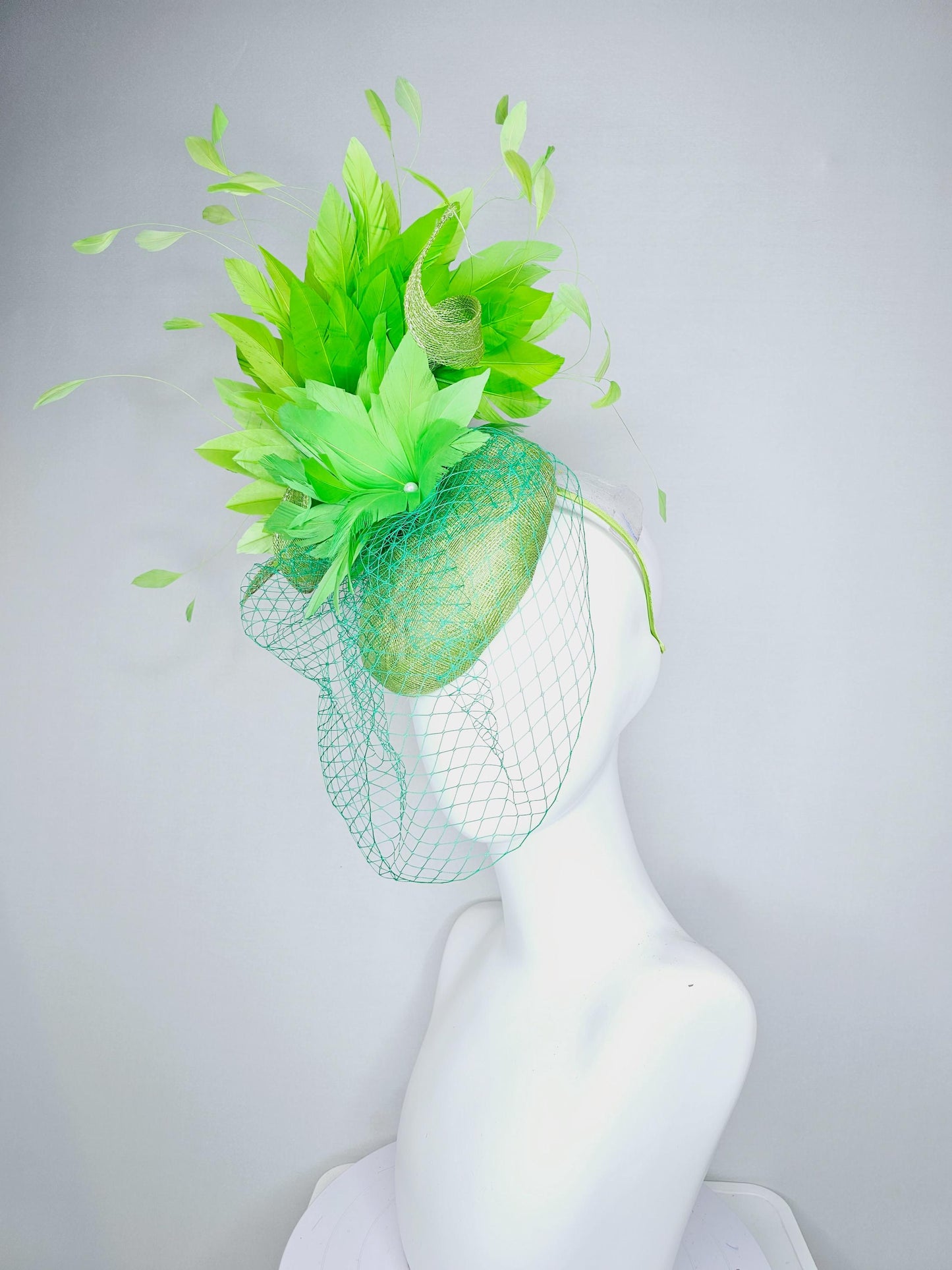 kentucky derby hat fascinator lime green sinamay with sinamay curls bright green feather flower lime green feathers with green mesh veil