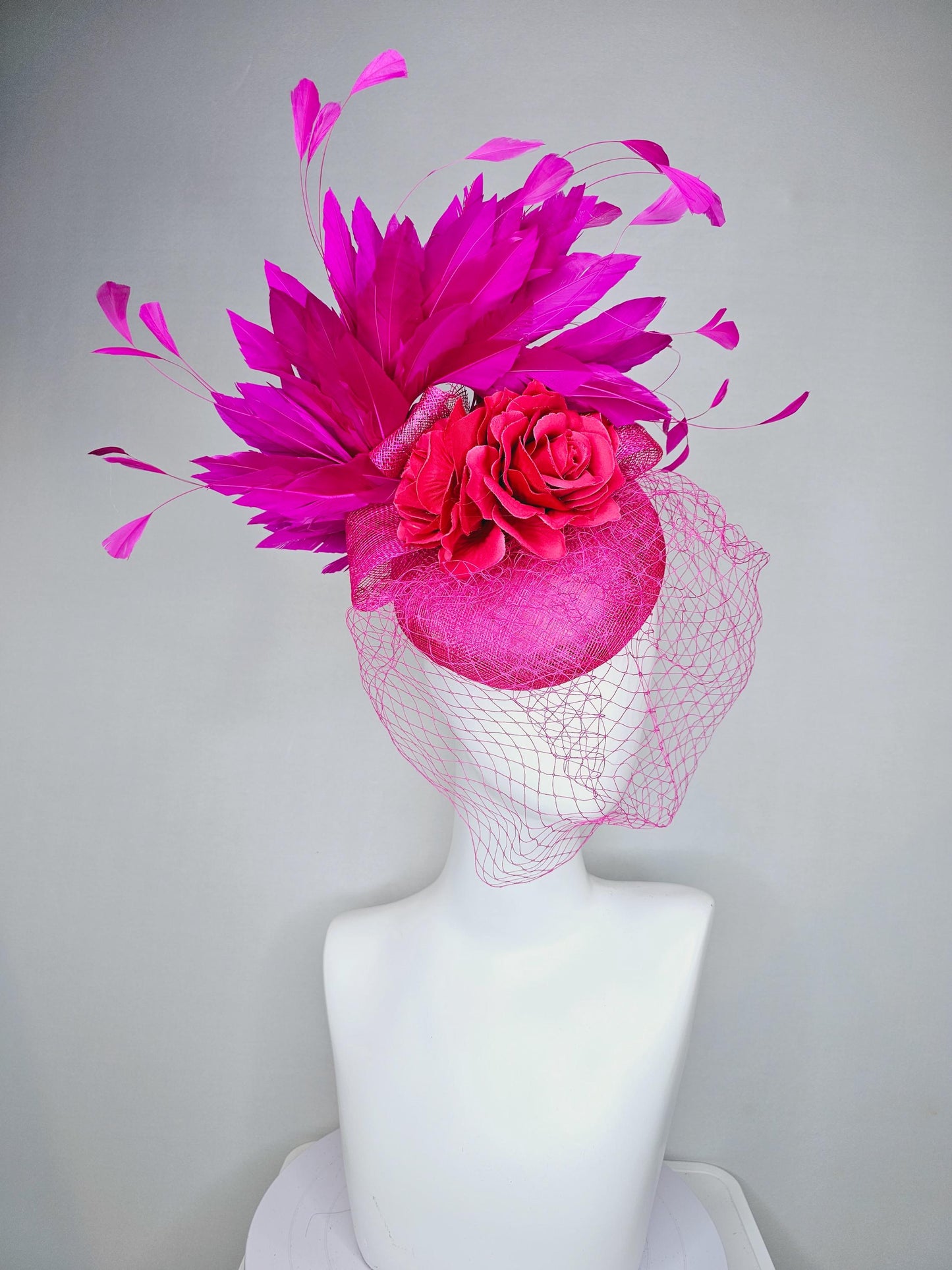 kentucky derby hat fascinator bright pink sinamay with sinamay bow and raspberry pink satin roses fuchsia pink feathers and pink mesh veil