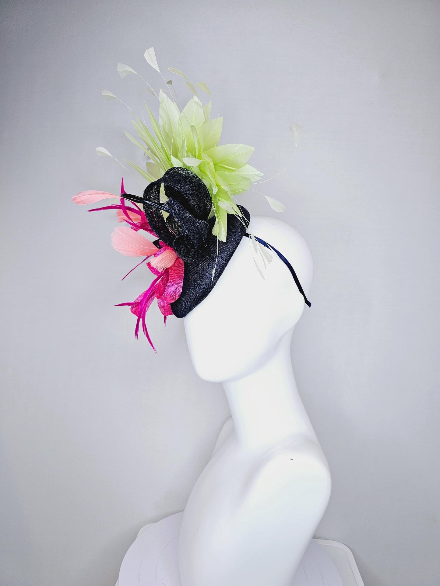 kentucky derby hat fascinator black sinamay with black and pink sinamay curls and pink feathers with light green branching feathers