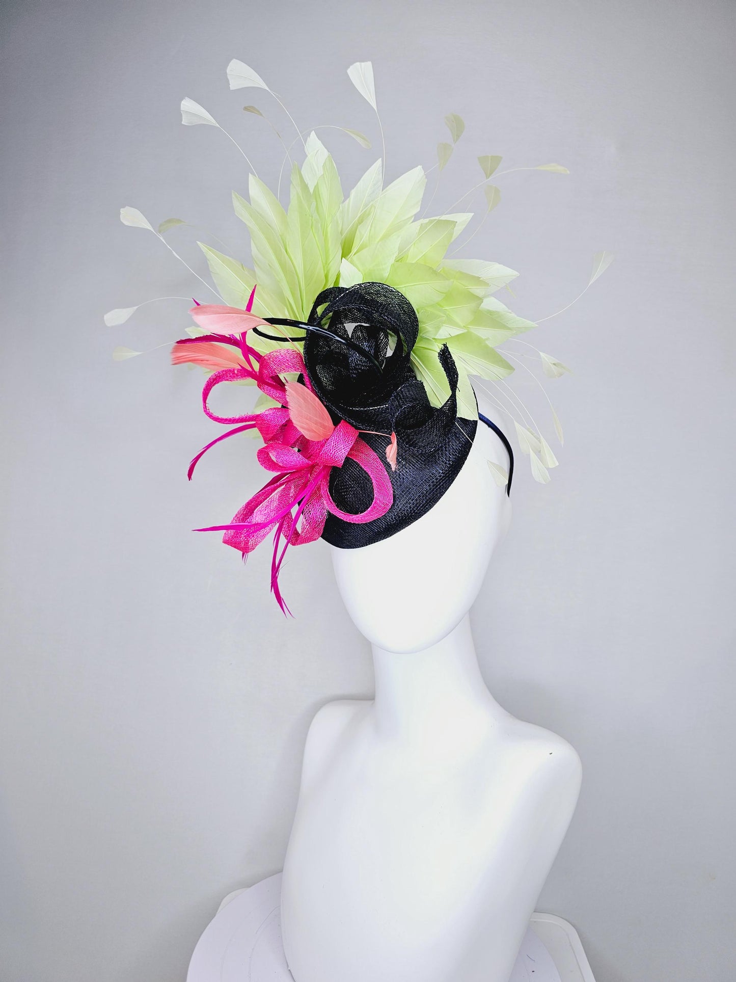 kentucky derby hat fascinator black sinamay with black and pink sinamay curls and pink feathers with light green branching feathers