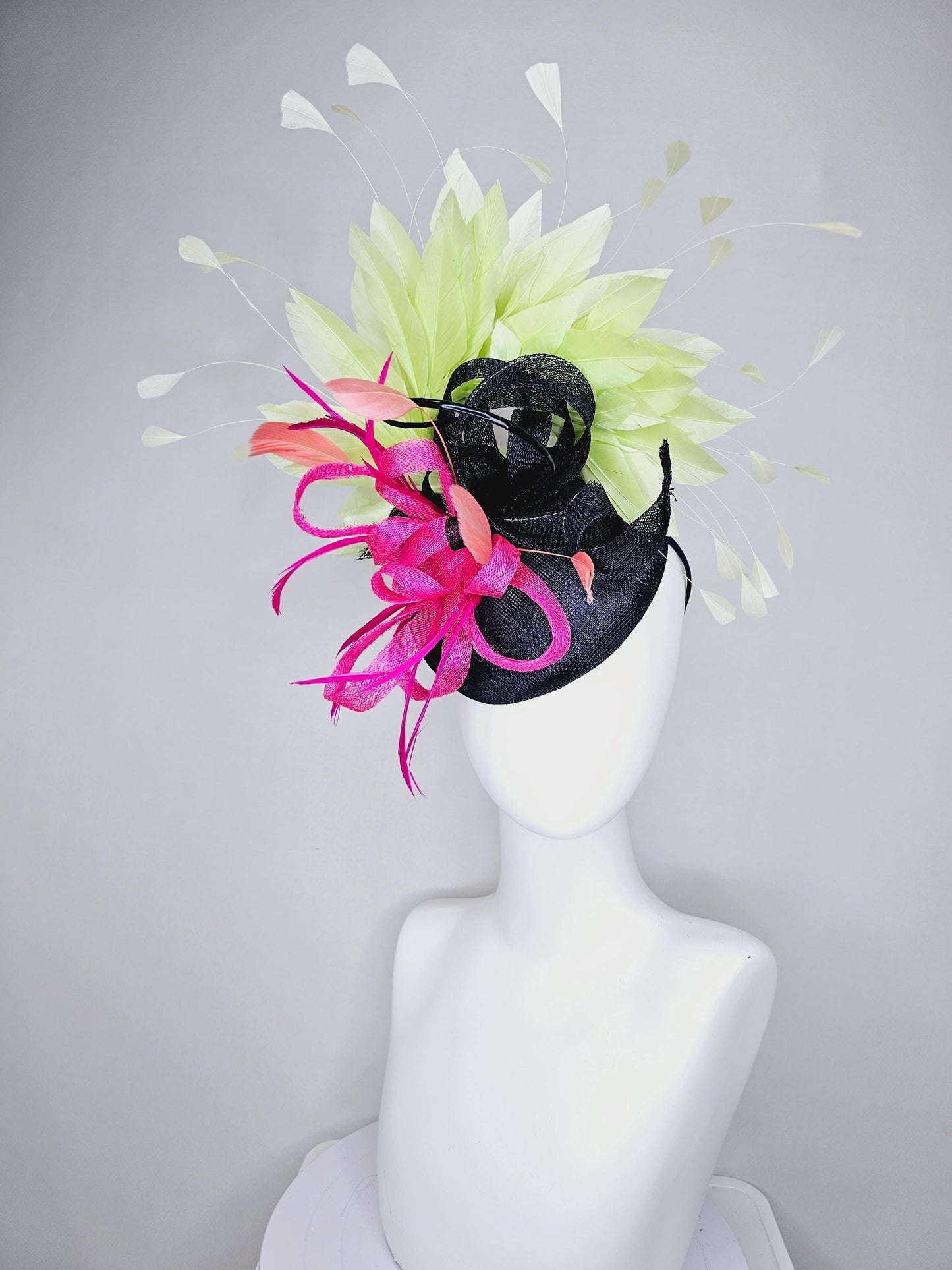 kentucky derby hat fascinator black sinamay with black and pink sinamay curls and pink feathers with light green branching feathers
