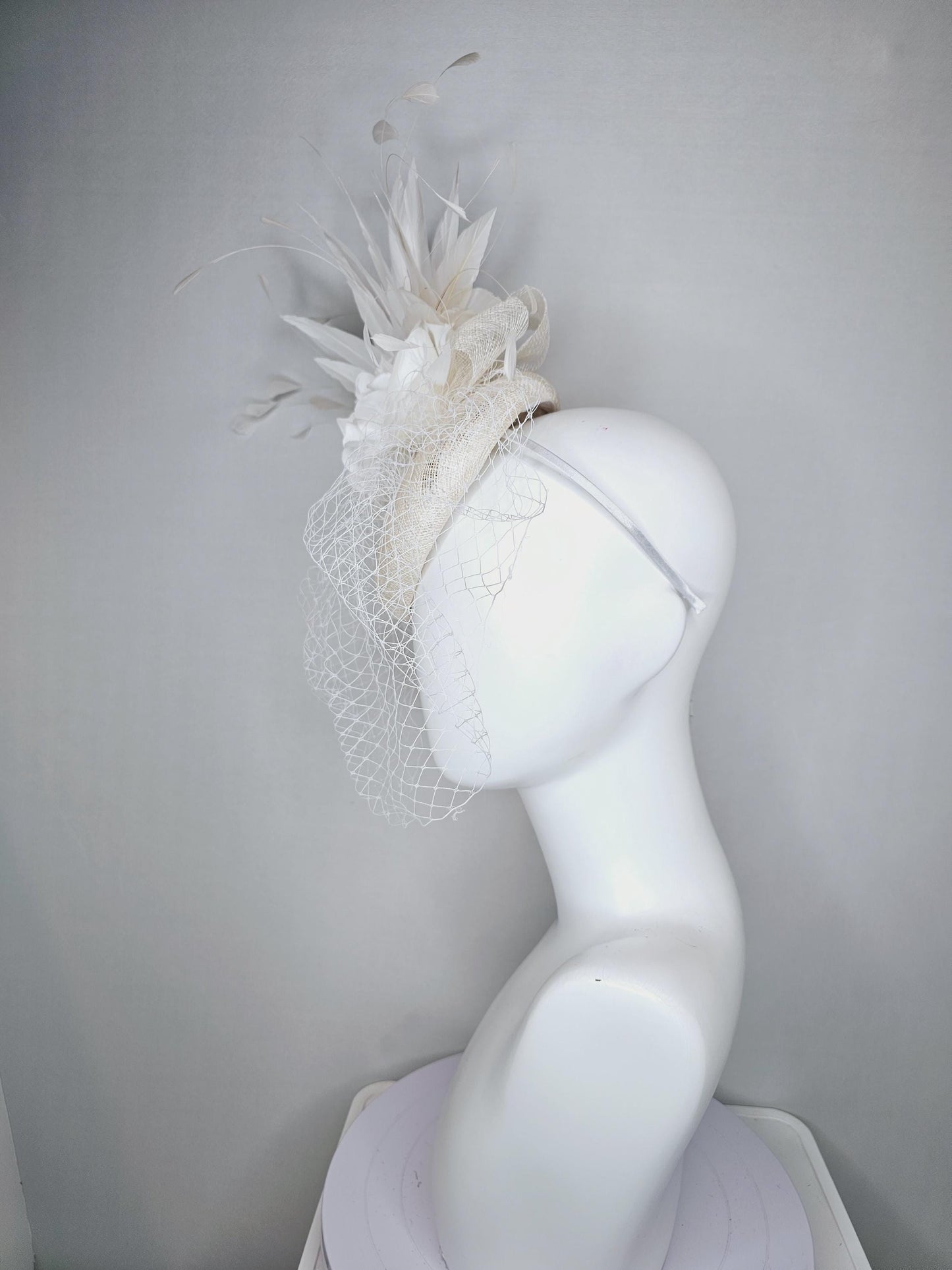 kentucky derby hat fascinator ivory white sinamay with sinamay bow and white satin roses white branching feathers with white mesh veil