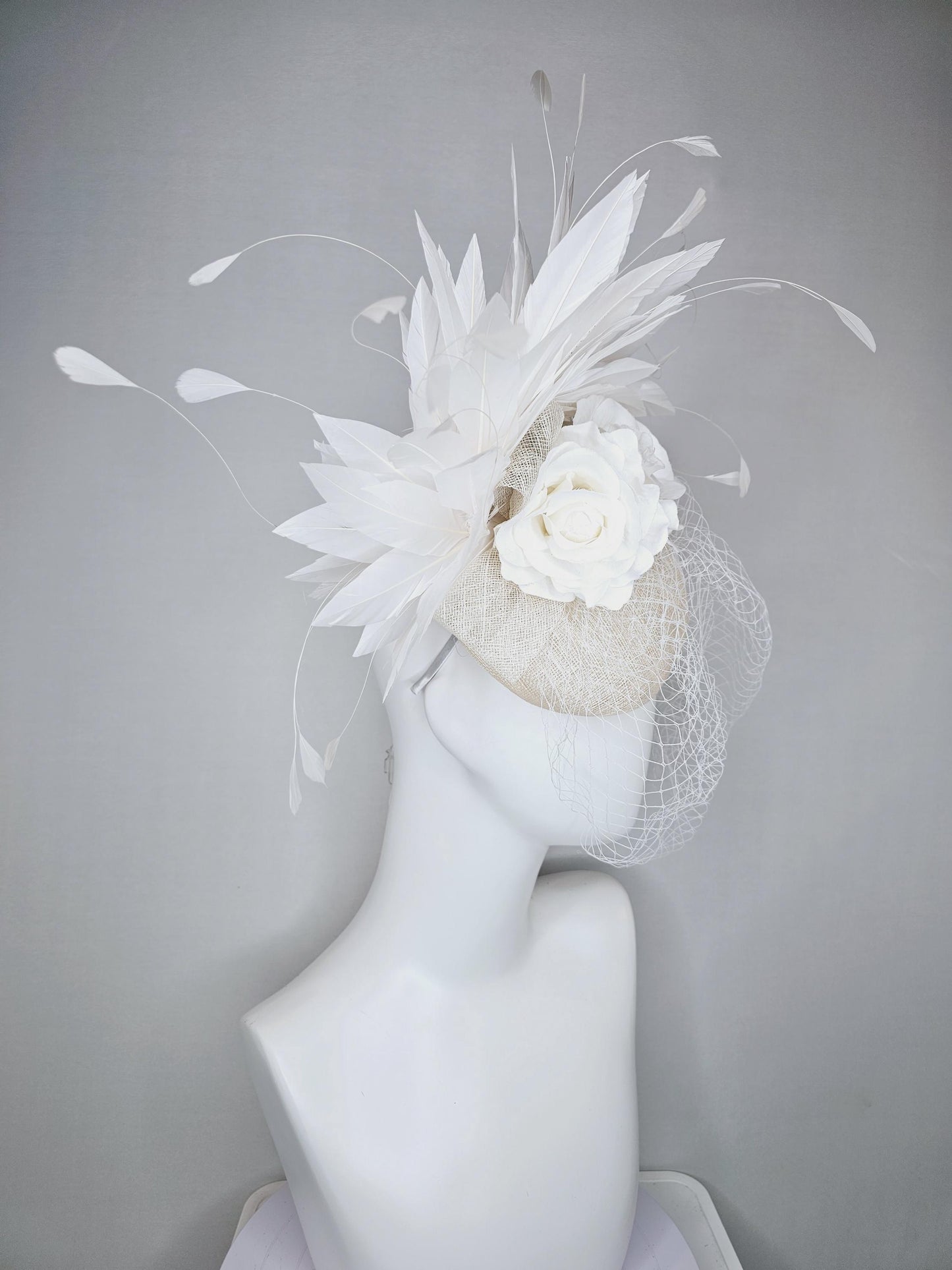 kentucky derby hat fascinator ivory white sinamay with sinamay bow and white satin roses white branching feathers with white mesh veil