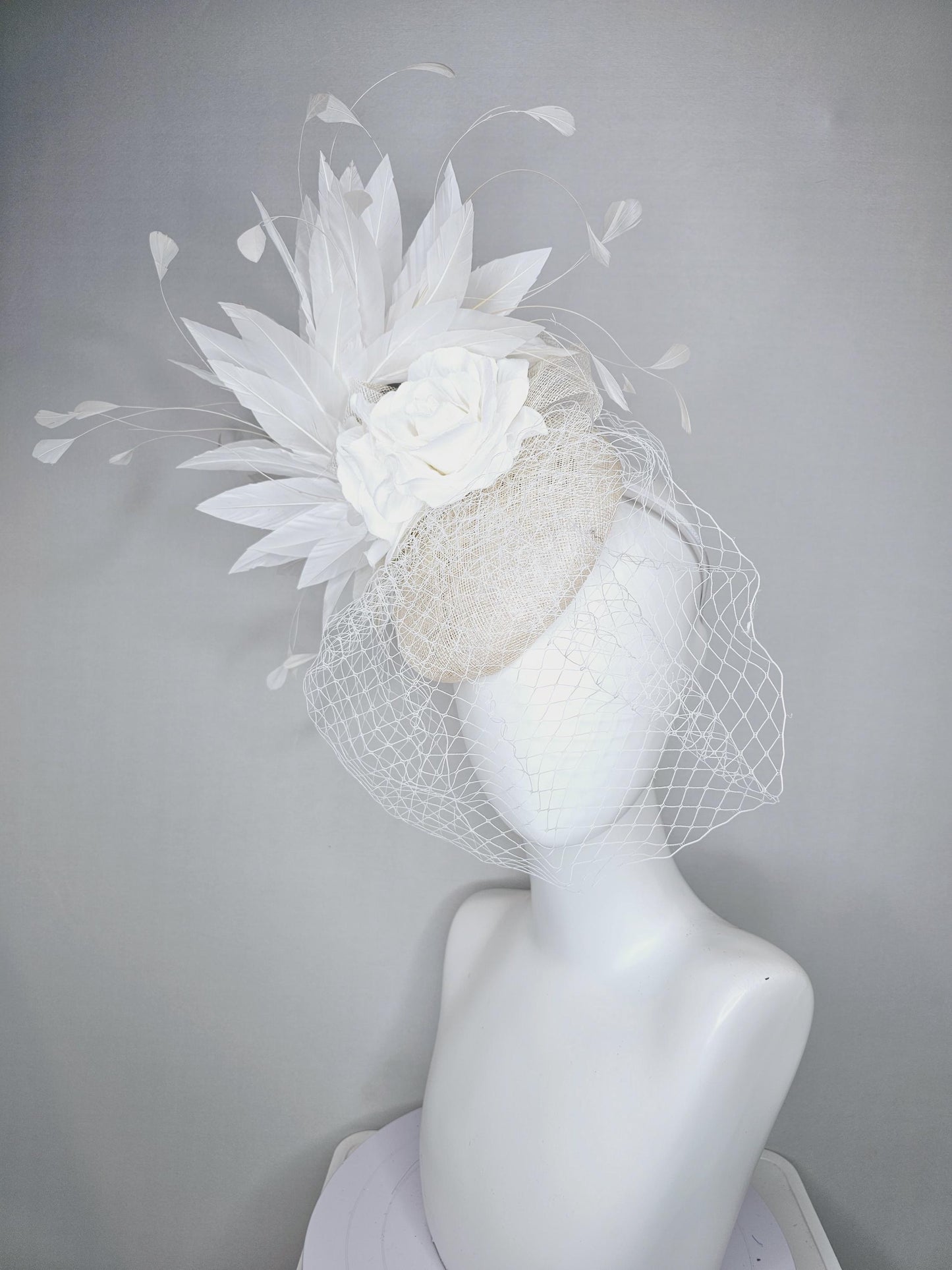 kentucky derby hat fascinator ivory white sinamay with sinamay bow and white satin roses white branching feathers with white mesh veil