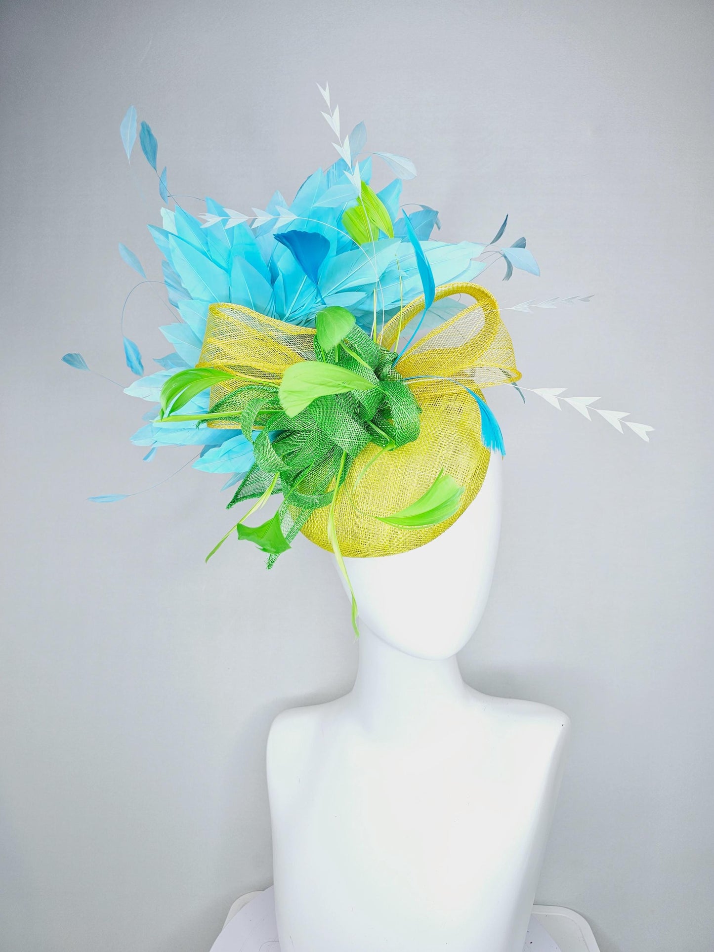 kentucky derby hat fascinator yellow sinamay with yellow and lime green sinamay bow white cut feathers and sky blue branching feathers