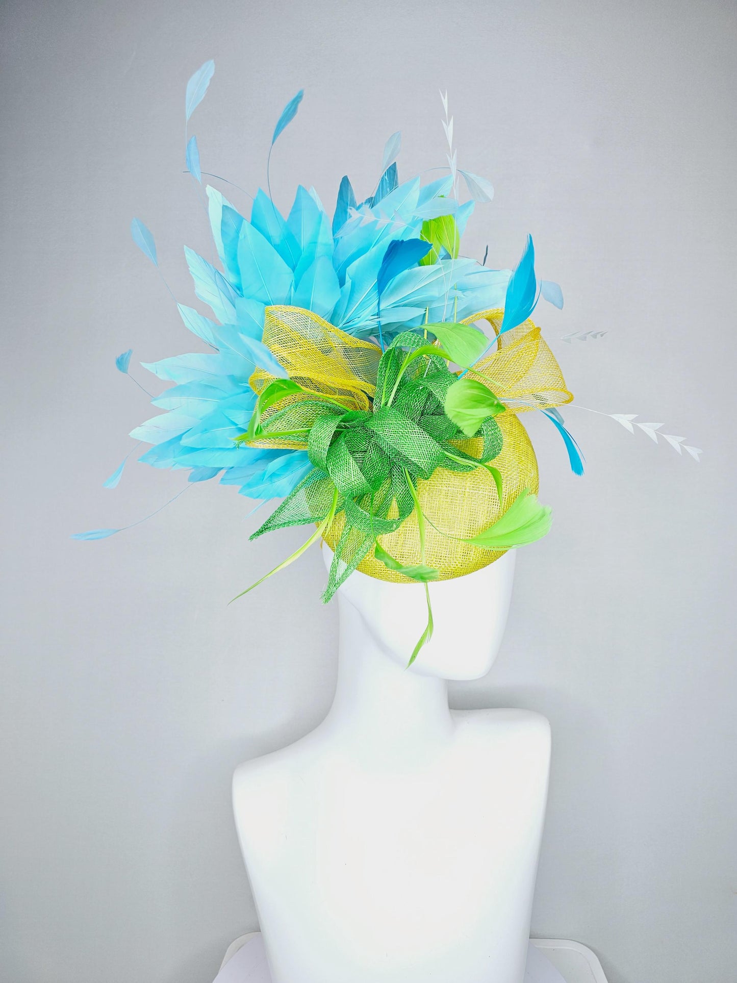 kentucky derby hat fascinator yellow sinamay with yellow and lime green sinamay bow white cut feathers and sky blue branching feathers